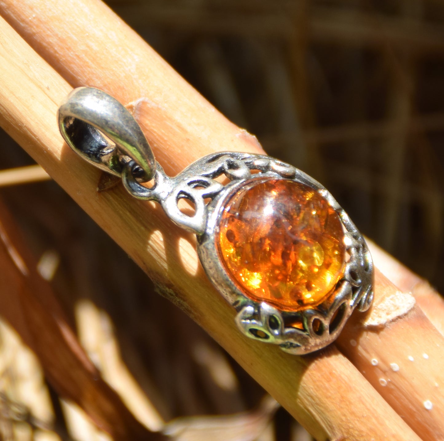 Elegant round pendant with natural cognac amber and 925 sterling silver, MJ Baltica, BW261