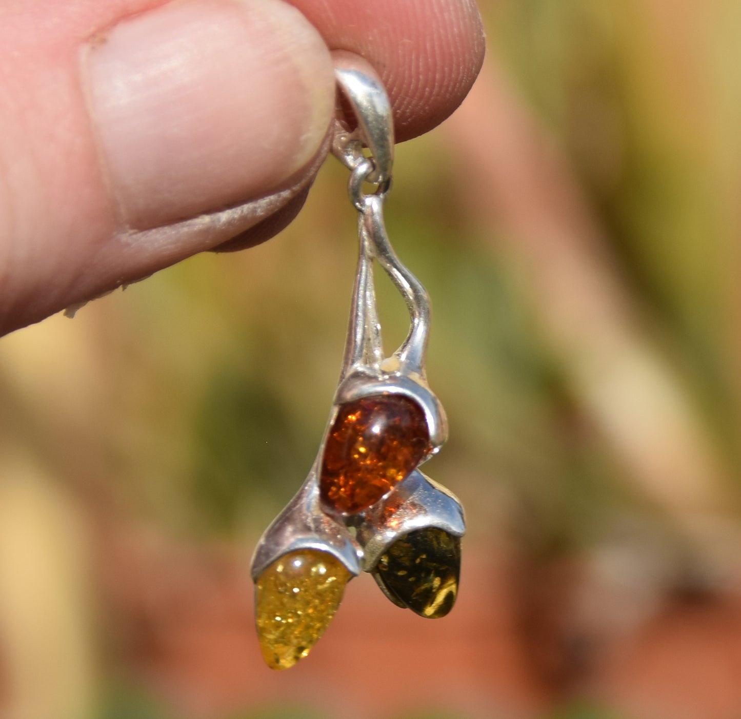 Luminous pendant with branch and natural Amber leaves in various shades, set in 925 Sterling Silver, MJ Baltica, BW309