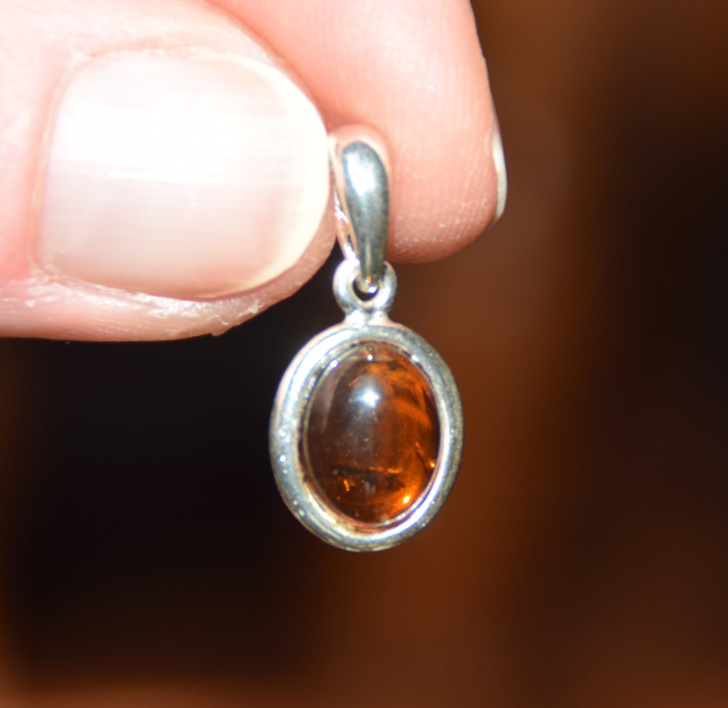 Delicate pendant created with natural cognac-colored Amber and Sterling Silver 925, MJ Baltica, BW335