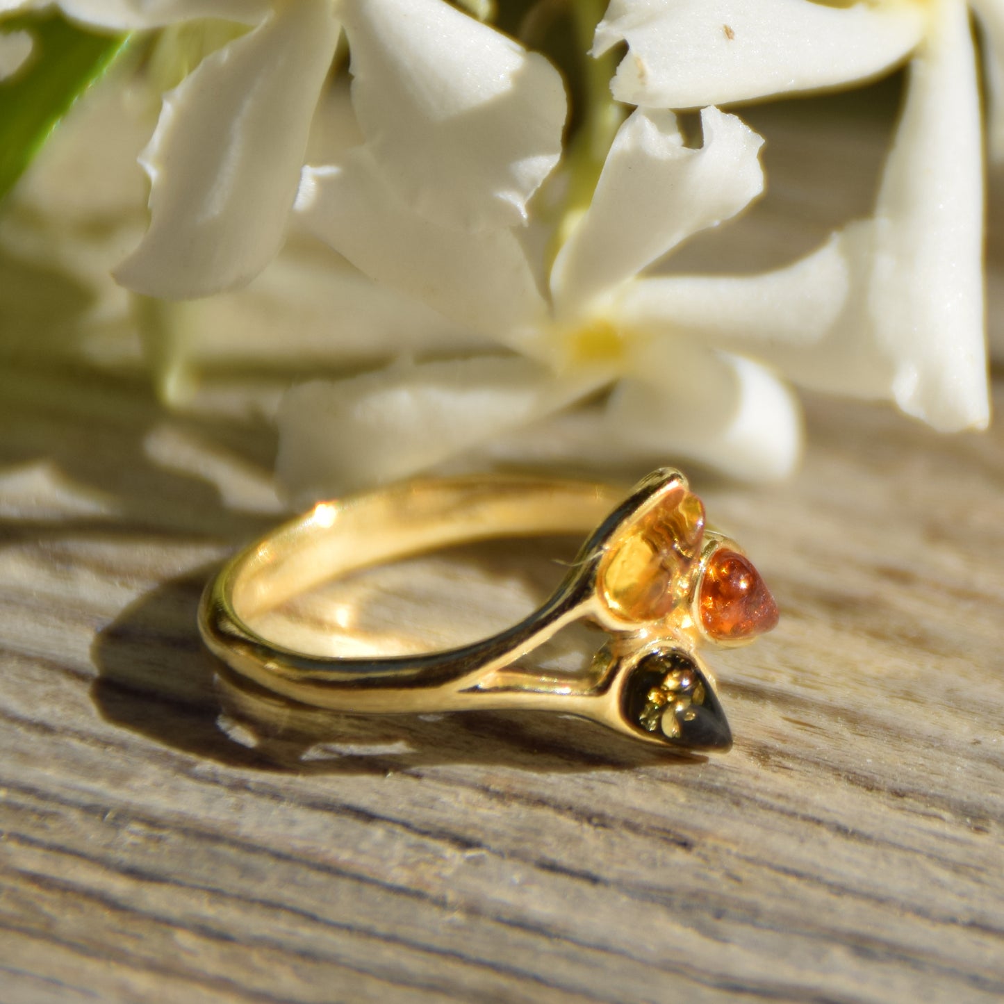 Delicate luminous floral-style ring created with natural Amber of various shades and 18k Gold plated Silver, MJ Baltica, BZP046