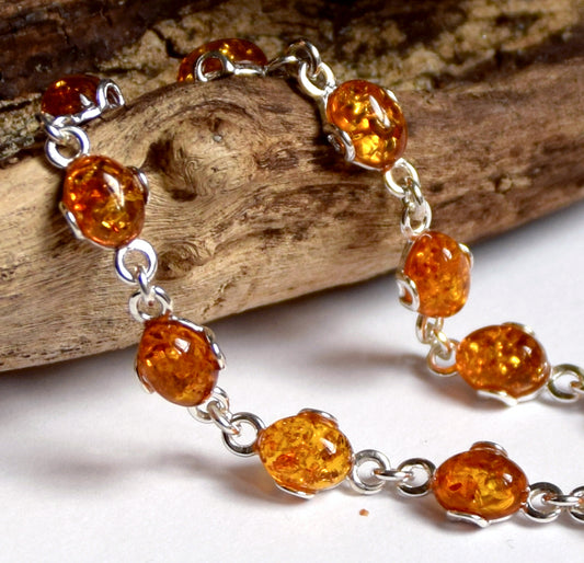 Bright adjustable chain bracelet crafted from natural cognac amber and 925 sterling silver, MJ Baltica, BB008