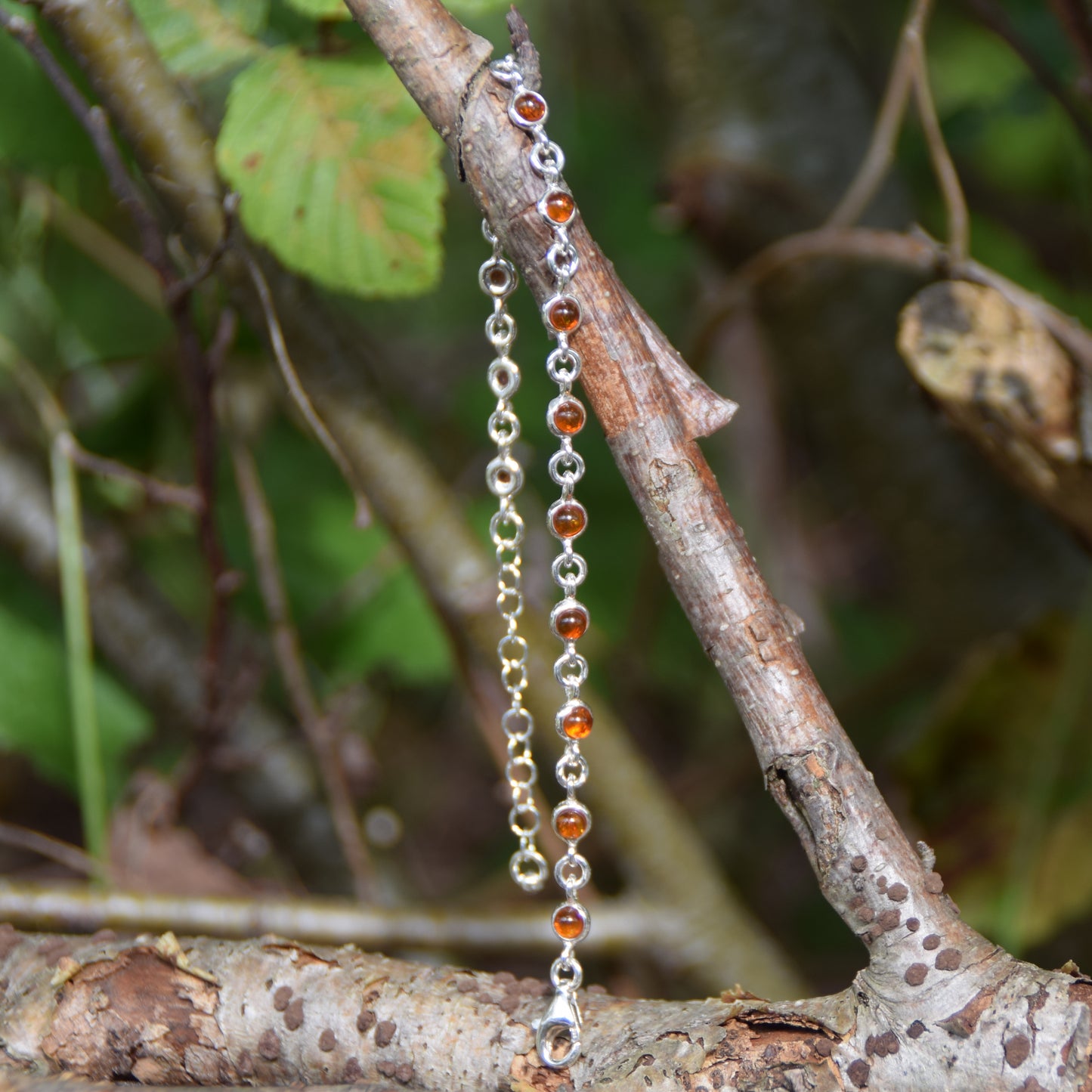 Delicate adjustable chain bracelet crafted with cognac-colored natural Amber and 925 Sterling Silver, MJ Baltica, BB014