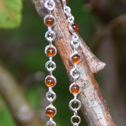 Delicate adjustable chain bracelet crafted with cognac-colored natural Amber and 925 Sterling Silver, MJ Baltica, BB014