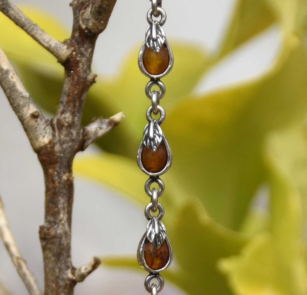 Delicate vintage style bracelet with floral embellishment in natural cognac Amber and Sterling Silver 925, MJ Baltica, BB039