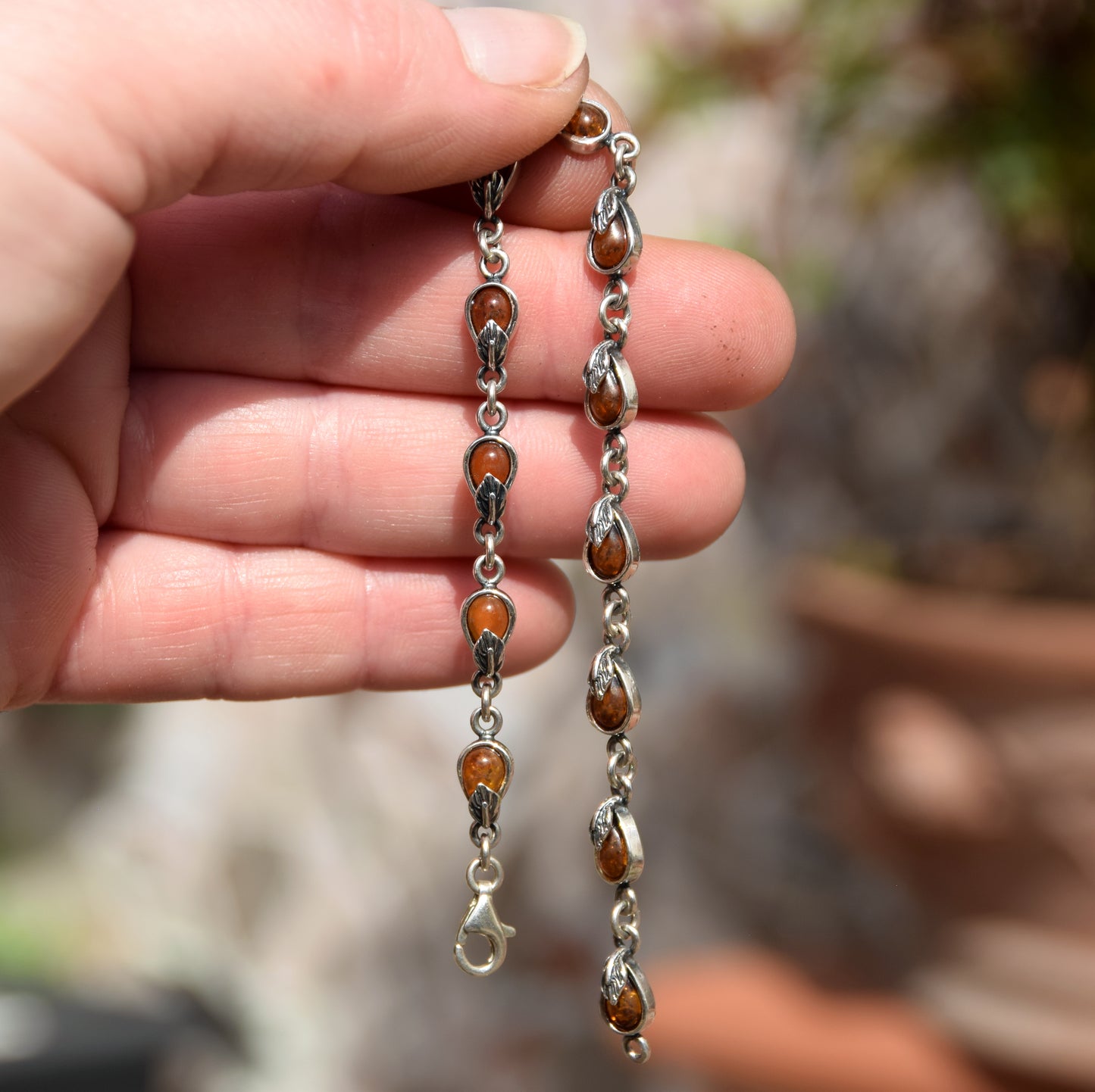 Delicate vintage style bracelet with floral embellishment in natural cognac Amber and Sterling Silver 925, MJ Baltica, BB039