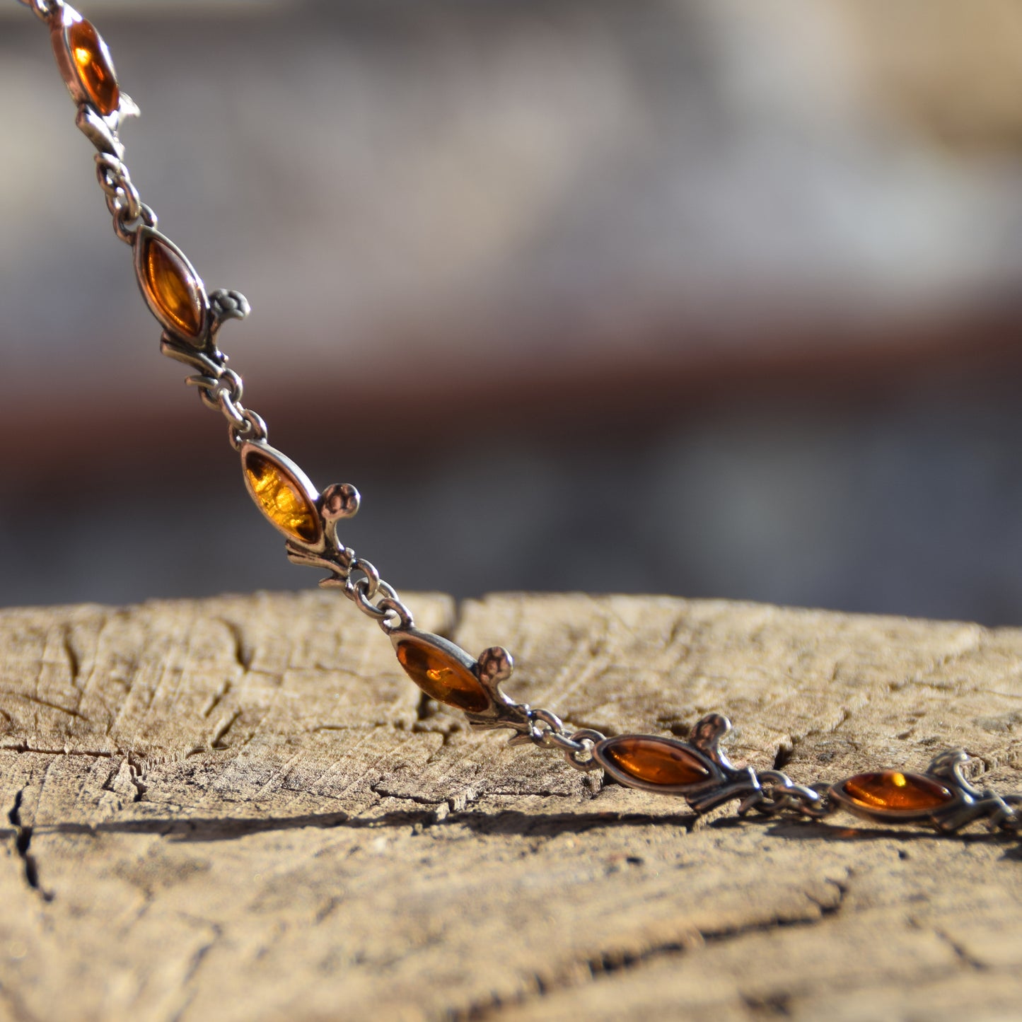 Delicate vintage style bracelet with floral decoration in natural cognac amber and 925 sterling silver, MJ Baltica, BB040