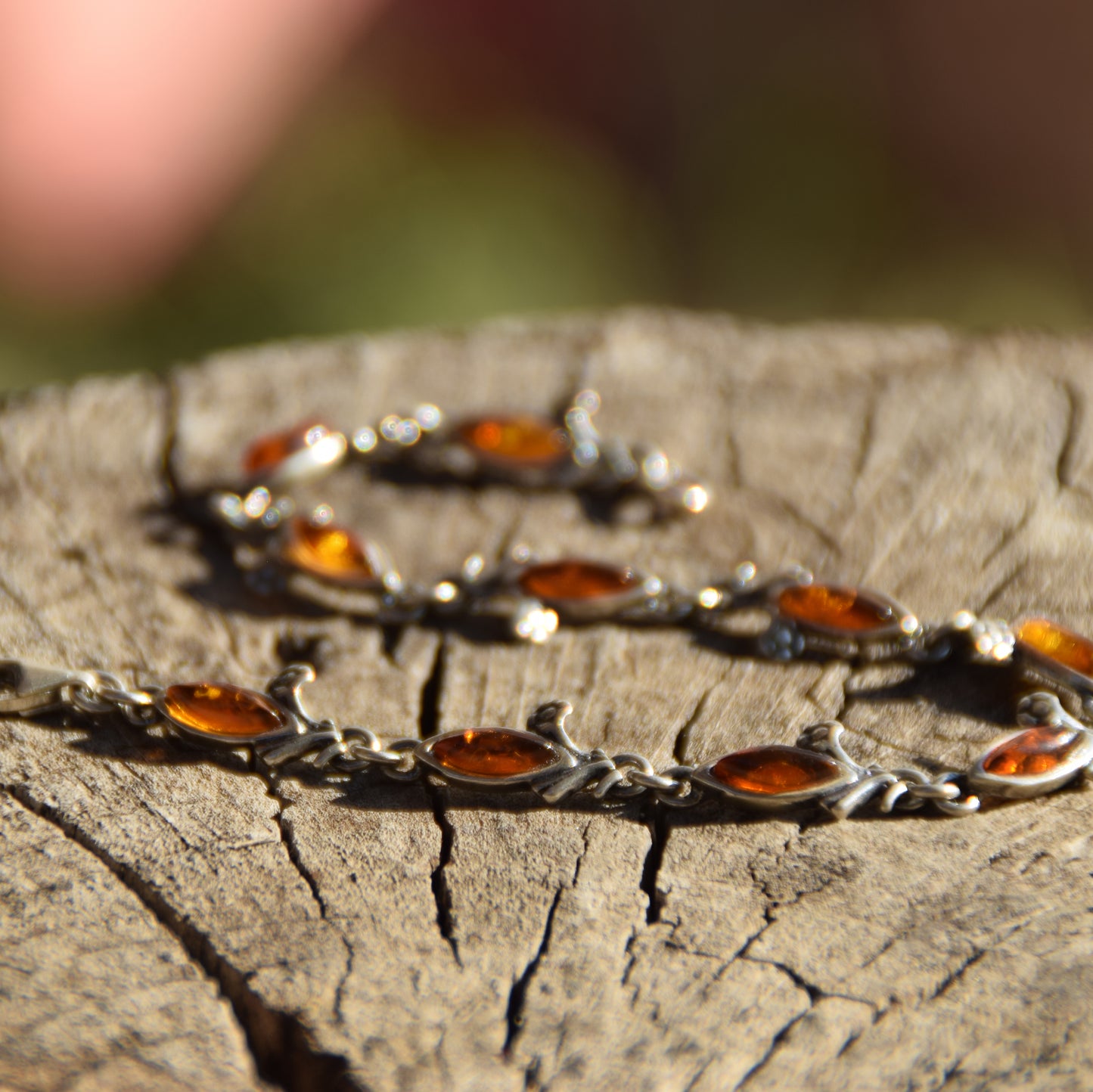 Delicate vintage style bracelet with floral decoration in natural cognac amber and 925 sterling silver, MJ Baltica, BB040