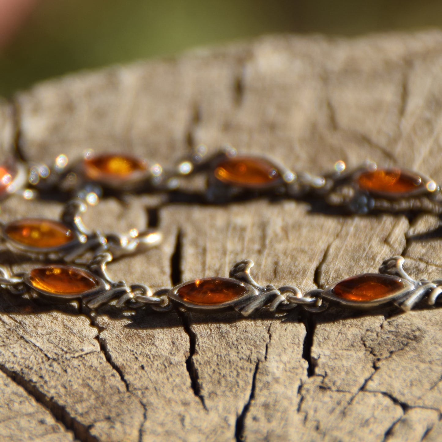 Delicate vintage style bracelet with floral decoration in natural cognac amber and 925 sterling silver, MJ Baltica, BB040