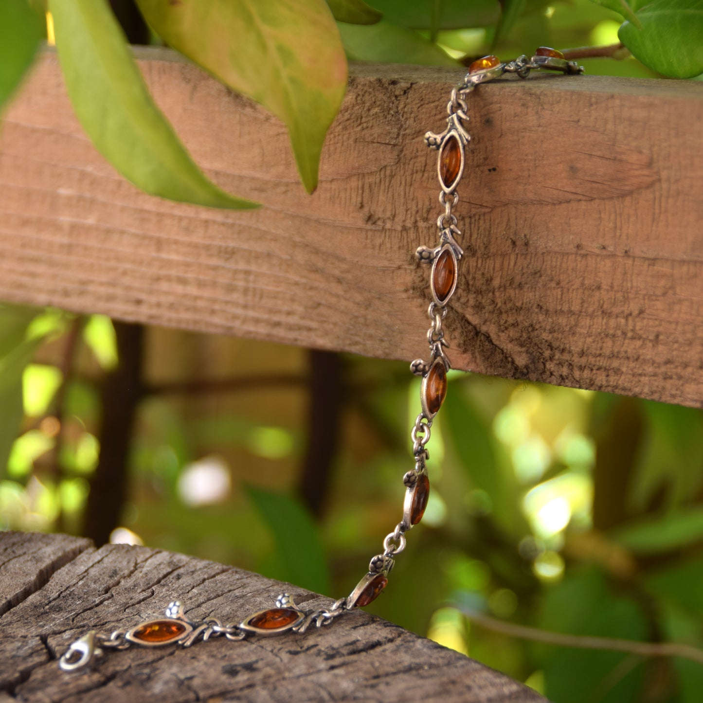 Delicate vintage style bracelet with floral decoration in natural cognac amber and 925 sterling silver, MJ Baltica, BB040