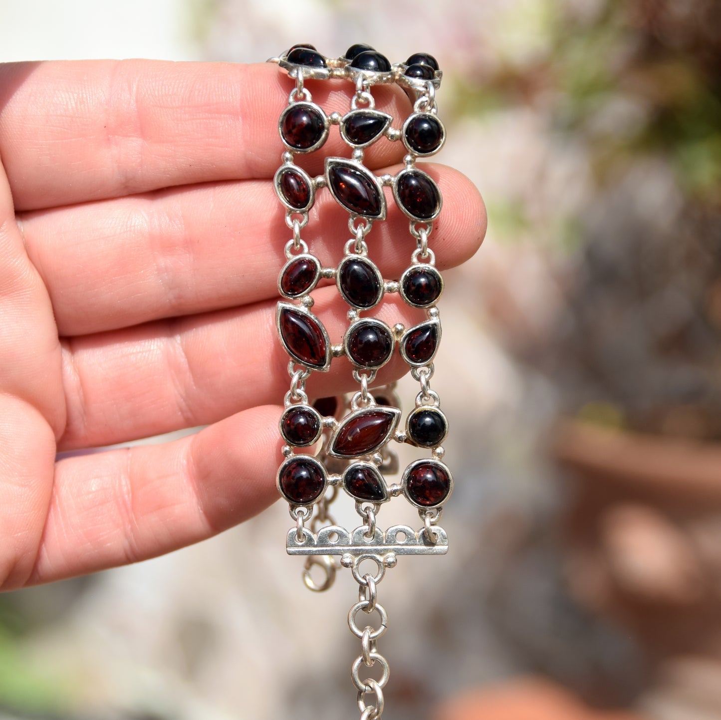 High cuff bracelet with gem mosaic created with dark brown natural amber and 925 silver, MJ Baltica, BB062