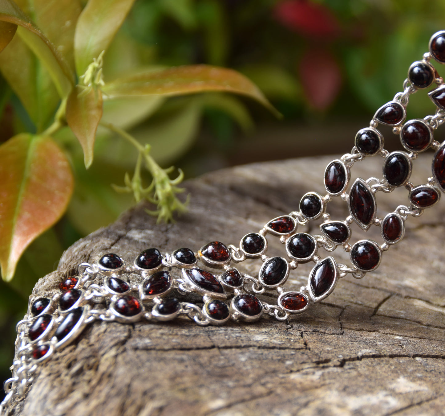 High cuff bracelet with gem mosaic created with dark brown natural amber and 925 silver, MJ Baltica, BB062