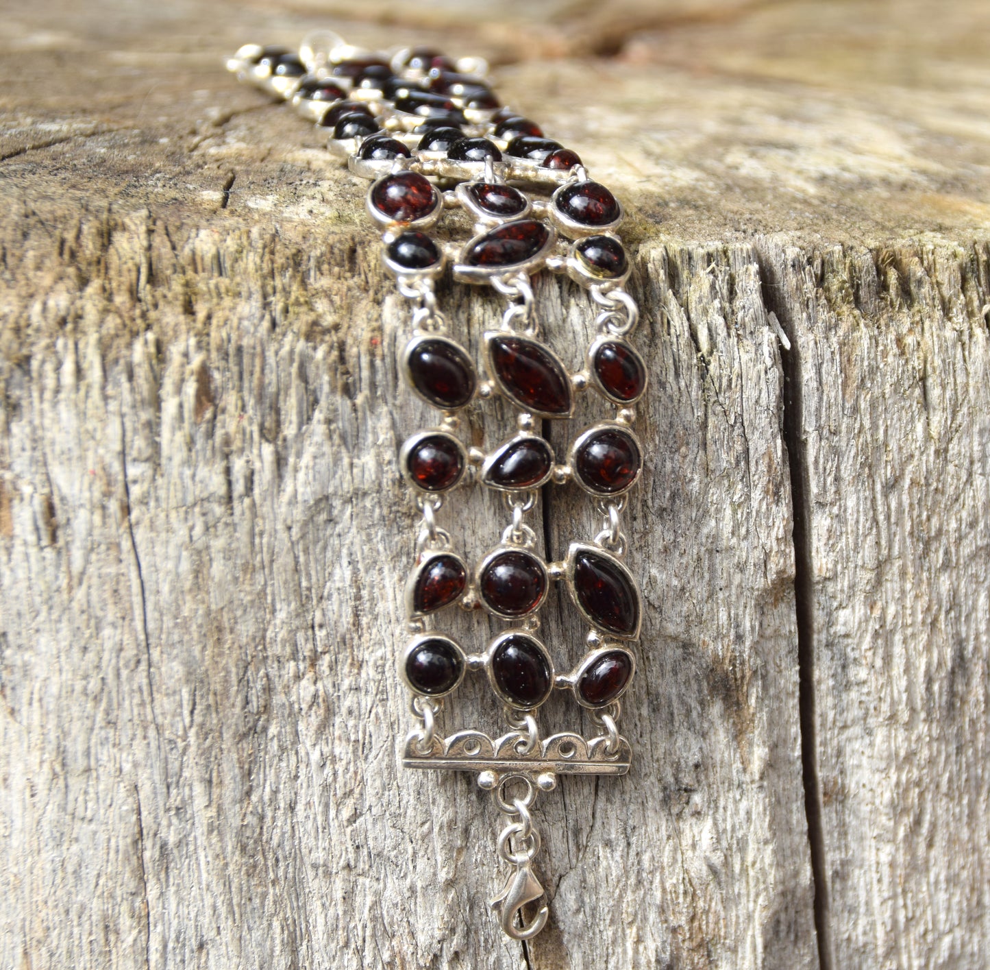 High cuff bracelet with gem mosaic created with dark brown natural amber and 925 silver, MJ Baltica, BB062
