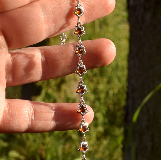 Delicate floral bracelet made of natural cognac-colored amber and 925 sterling silver, MJ Baltica, BB088
