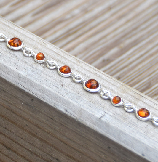 Delicate adjustable bracelet made with natural cognac-colored Amber and 925 Sterling Silver, MJ Baltica, BB094