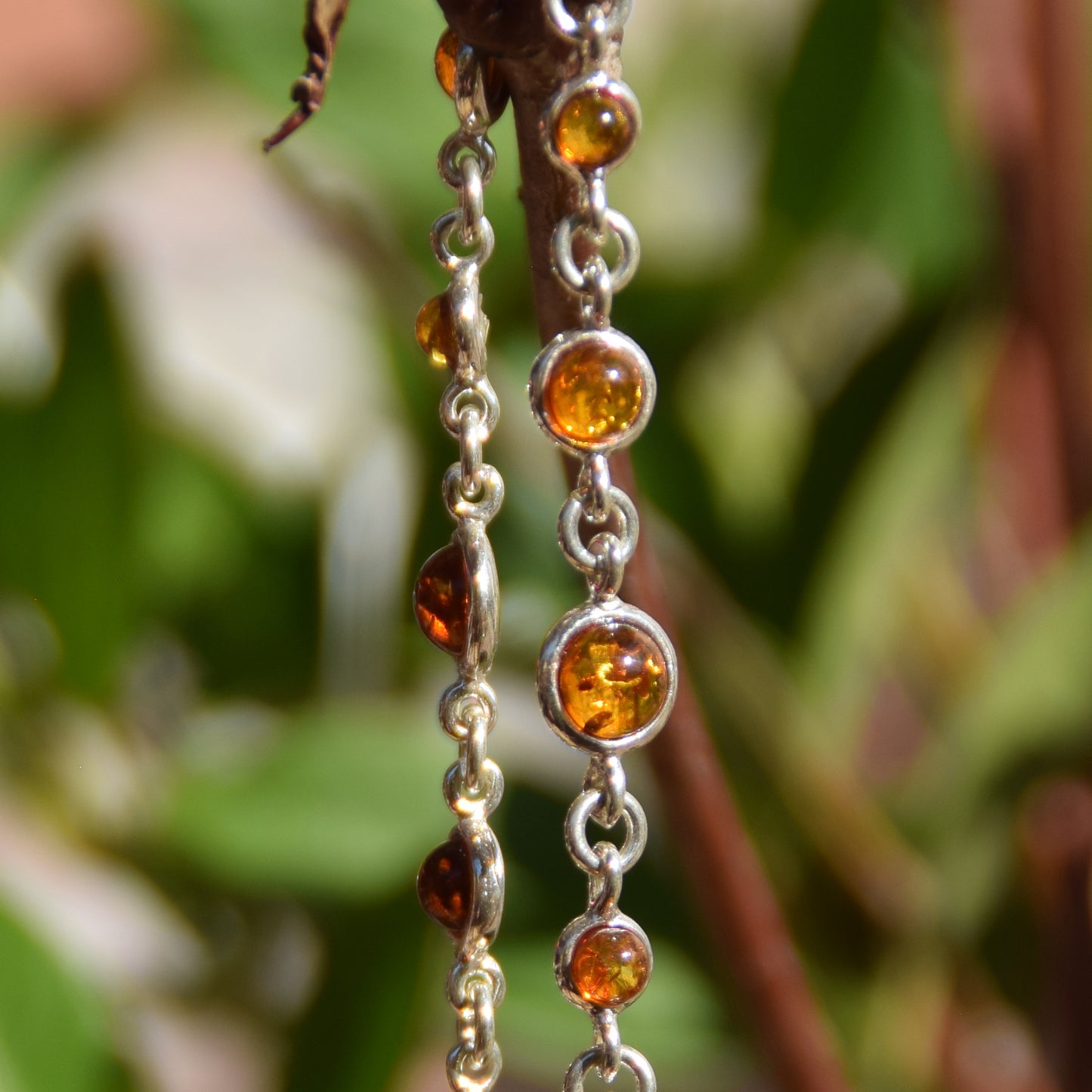 Delicate adjustable bracelet made with natural cognac-colored Amber and 925 Sterling Silver, MJ Baltica, BB094