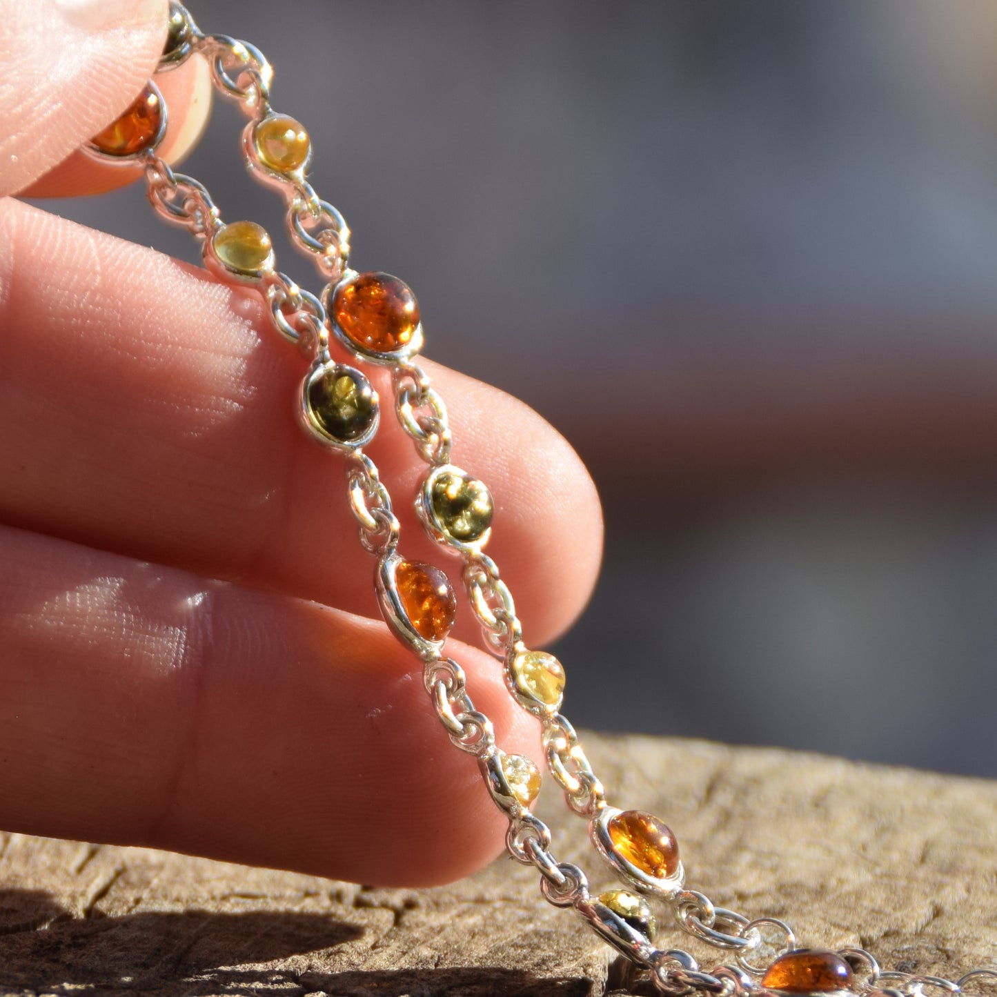 Delicate adjustable bracelet made of natural Amber in various shades and 925 Silver, MJ Baltica, BB095