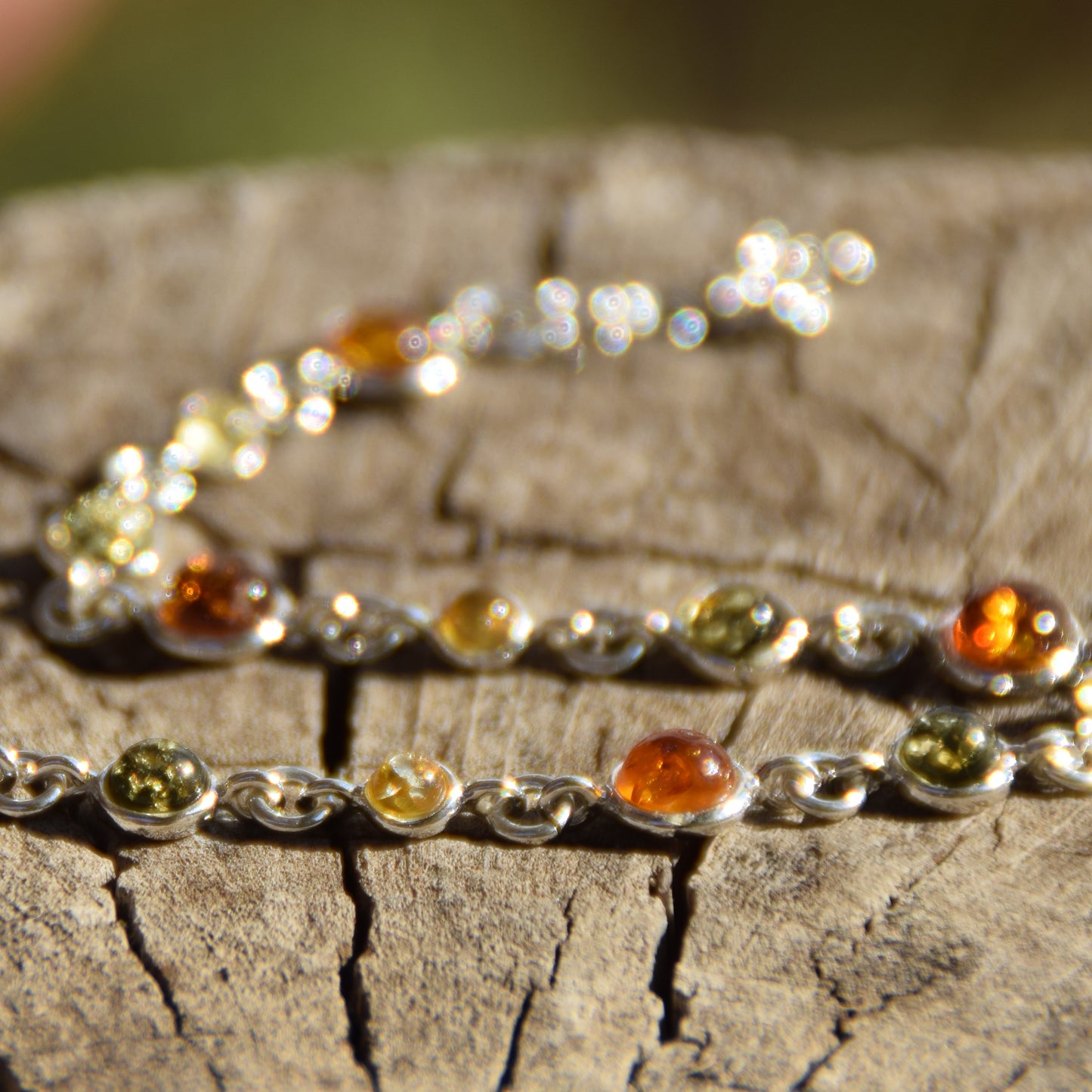 Delicate adjustable bracelet made of natural Amber in various shades and 925 Silver, MJ Baltica, BB095