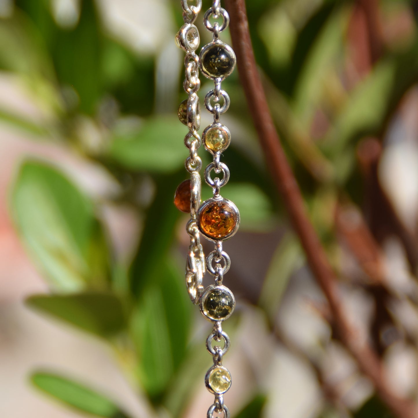 Delicate adjustable bracelet made of natural Amber in various shades and 925 Silver, MJ Baltica, BB095