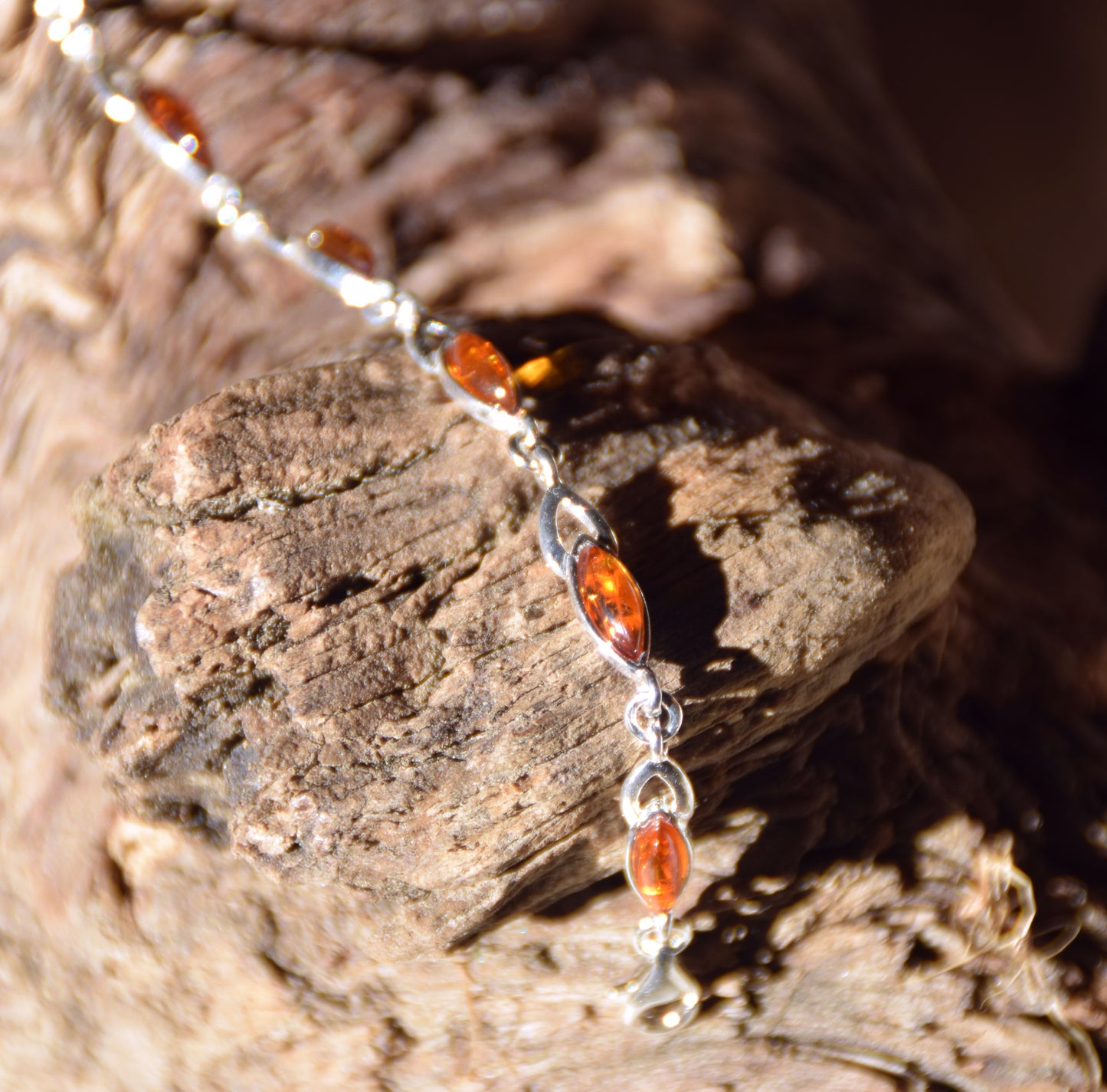 Bright adjustable bracelet created with natural cognac-colored Amber and 925 Silver, MJ Baltica, BB104