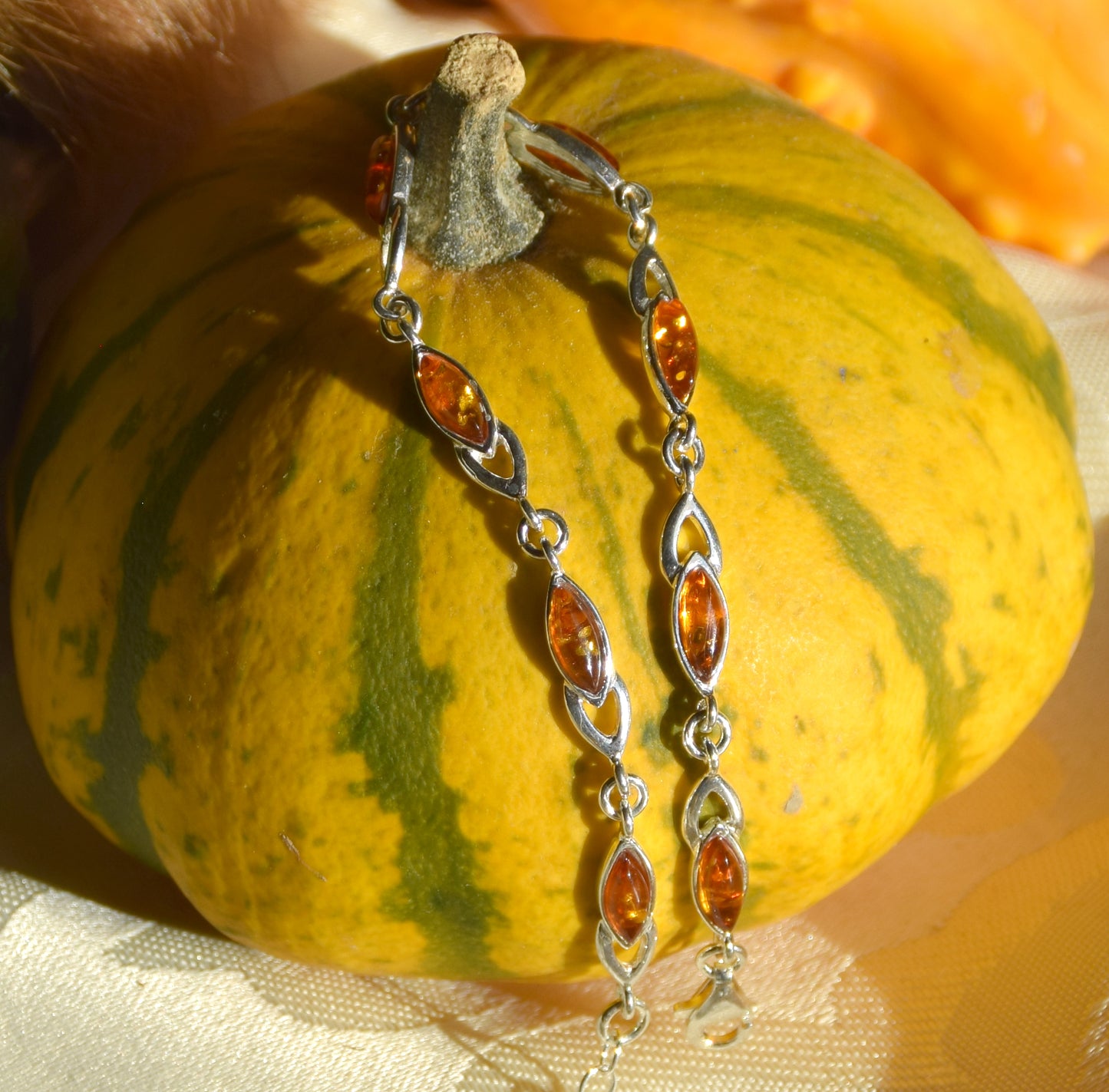 Bright adjustable bracelet created with natural cognac-colored Amber and 925 Silver, MJ Baltica, BB104
