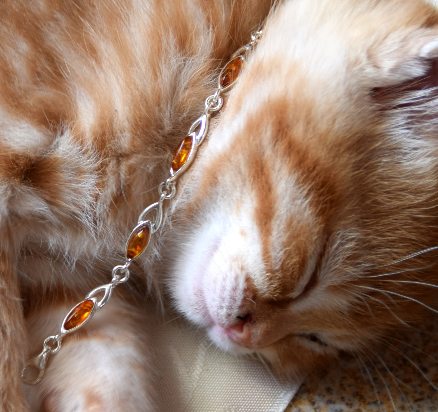 Bright adjustable bracelet created with natural cognac-colored Amber and 925 Silver, MJ Baltica, BB104