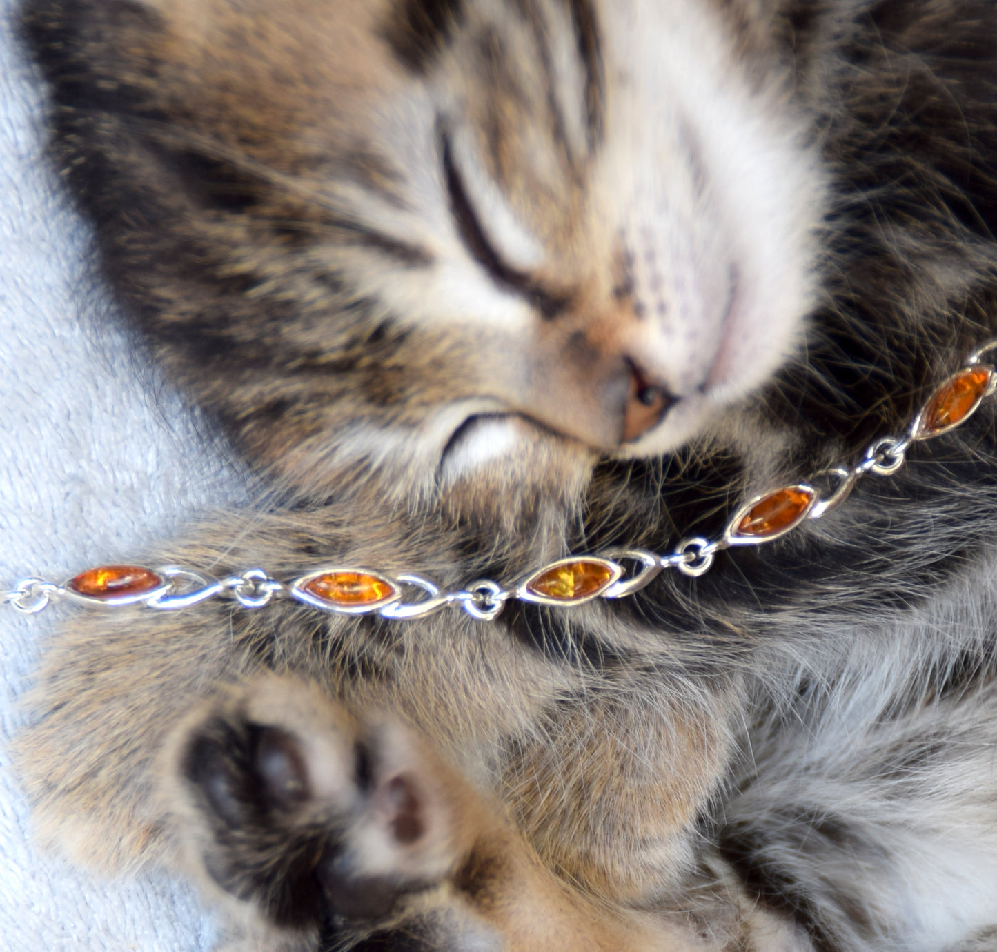 Bright adjustable bracelet created with natural cognac-colored Amber and 925 Silver, MJ Baltica, BB104