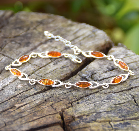 Bright adjustable bracelet created with natural cognac-colored Amber and 925 Silver, MJ Baltica, BB104