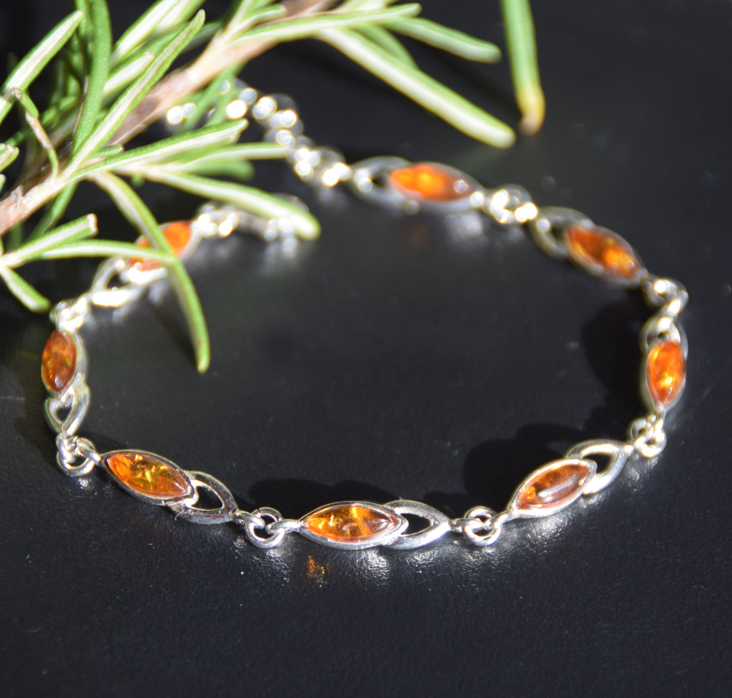 Bright adjustable bracelet created with natural cognac-colored Amber and 925 Silver, MJ Baltica, BB104