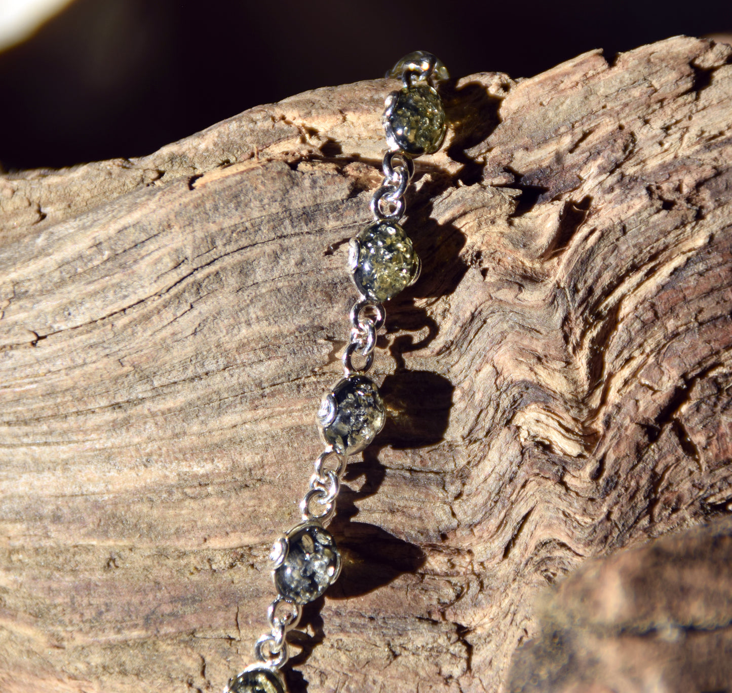 Adjustable chain bracelet in an essential style crafted from natural green amber and 925 sterling silver, MJ Baltica, BB105