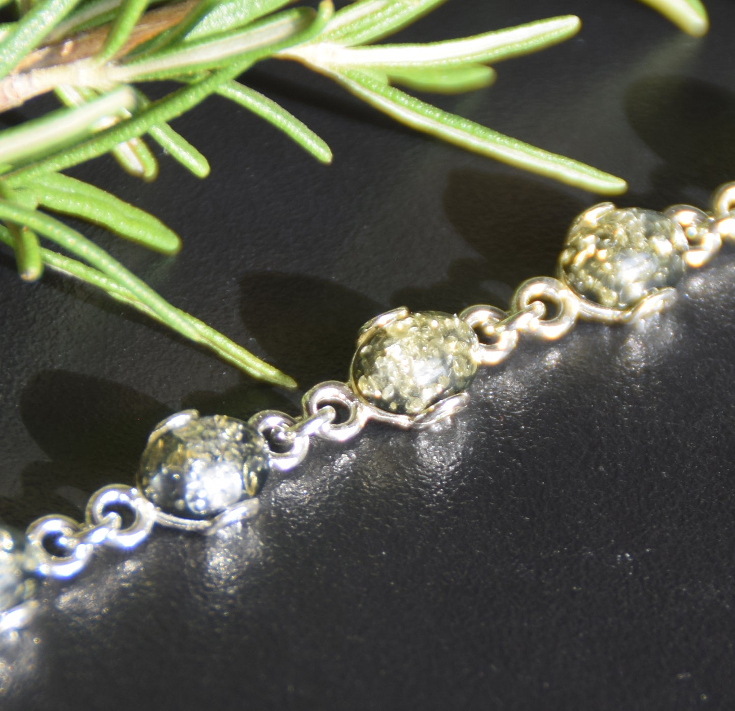 Adjustable chain bracelet in an essential style crafted from natural green amber and 925 sterling silver, MJ Baltica, BB105
