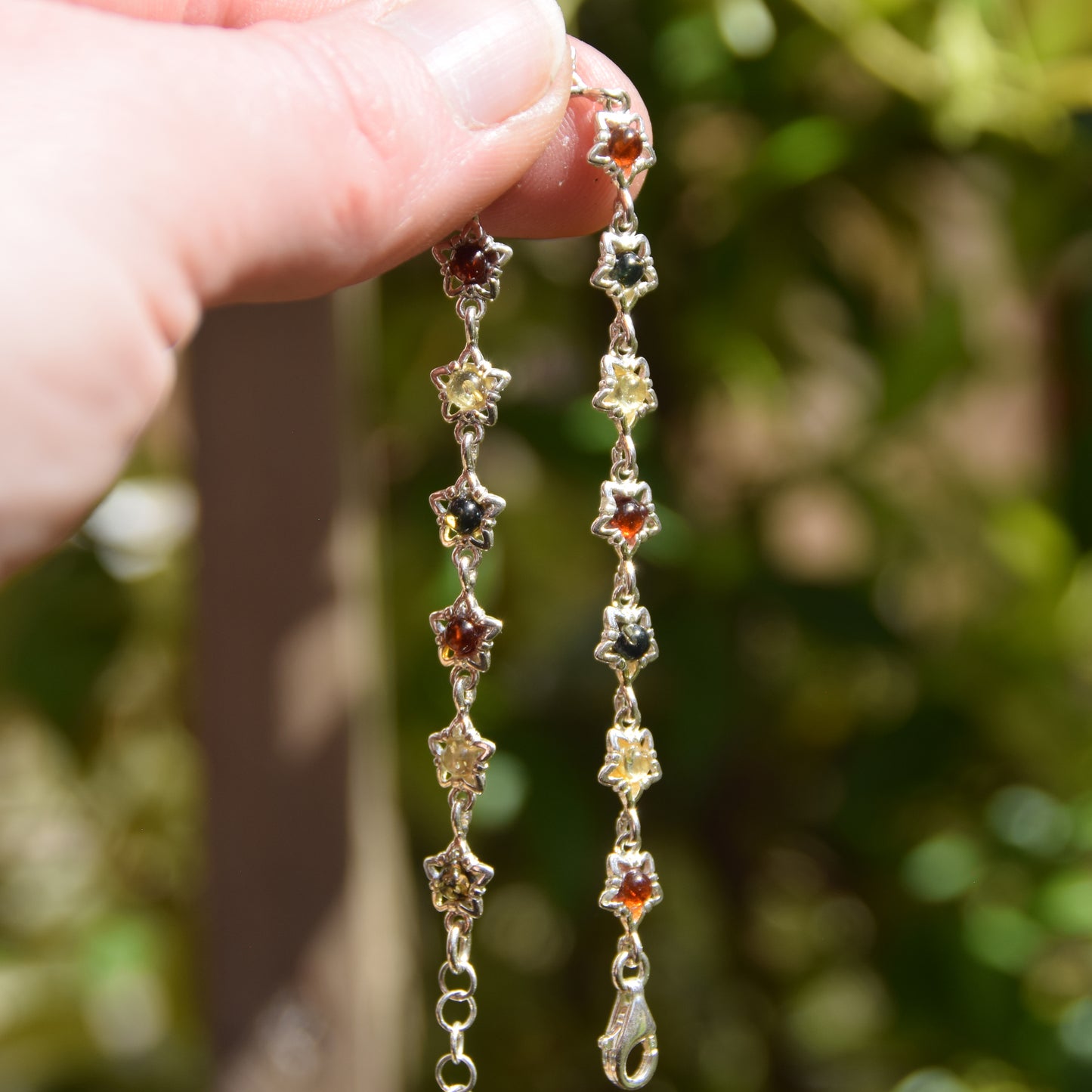 Delicate floral bracelet crafted from natural Amber in various shades and 925 Sterling Silver, MJ Baltica, BB108