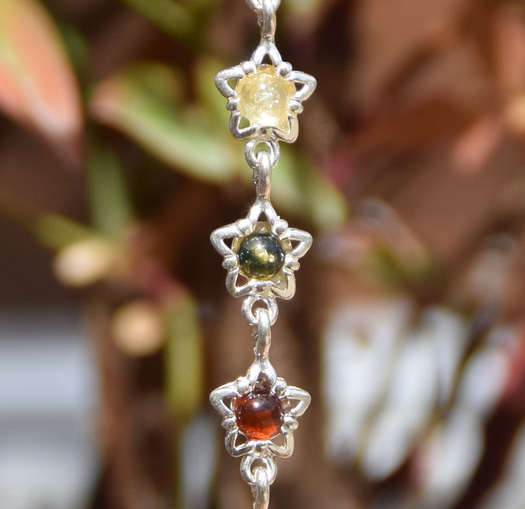 Delicate floral bracelet crafted from natural Amber in various shades and 925 Sterling Silver, MJ Baltica, BB108