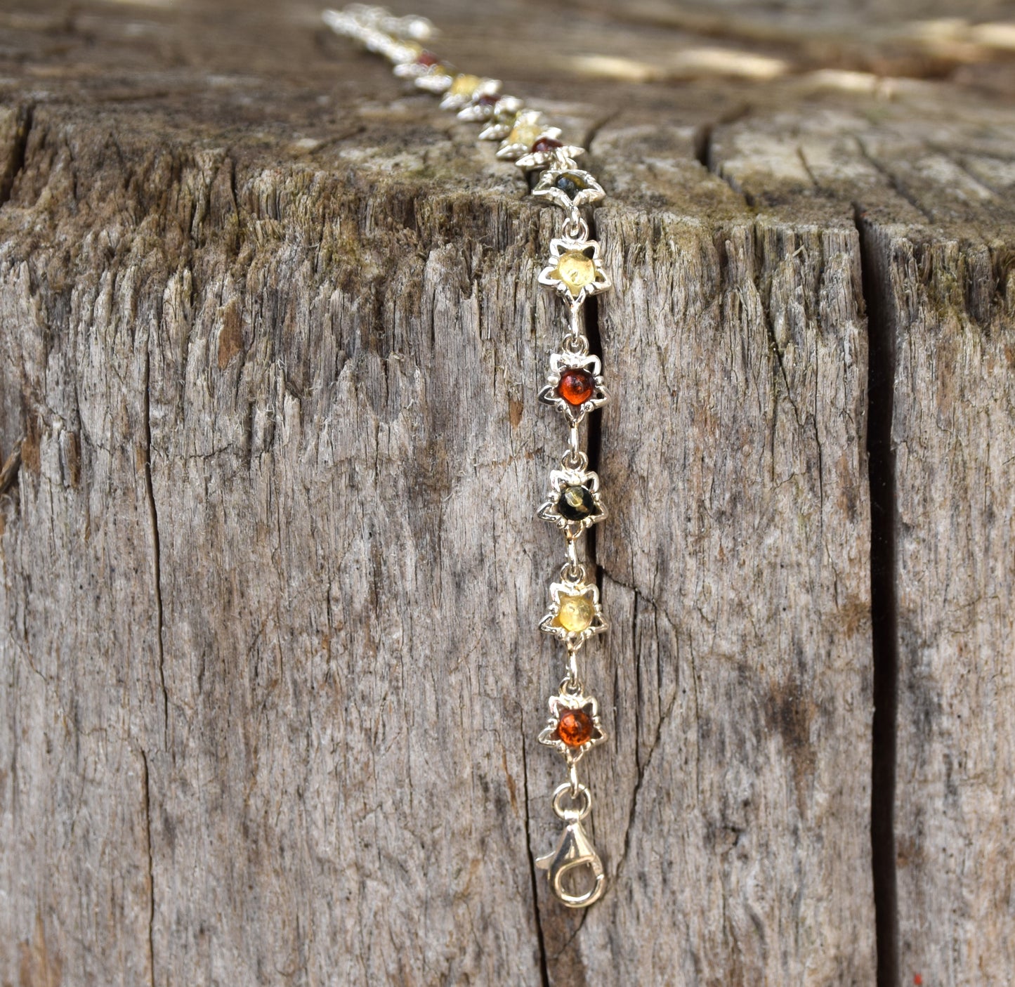 Delicate floral bracelet crafted from natural Amber in various shades and 925 Sterling Silver, MJ Baltica, BB108
