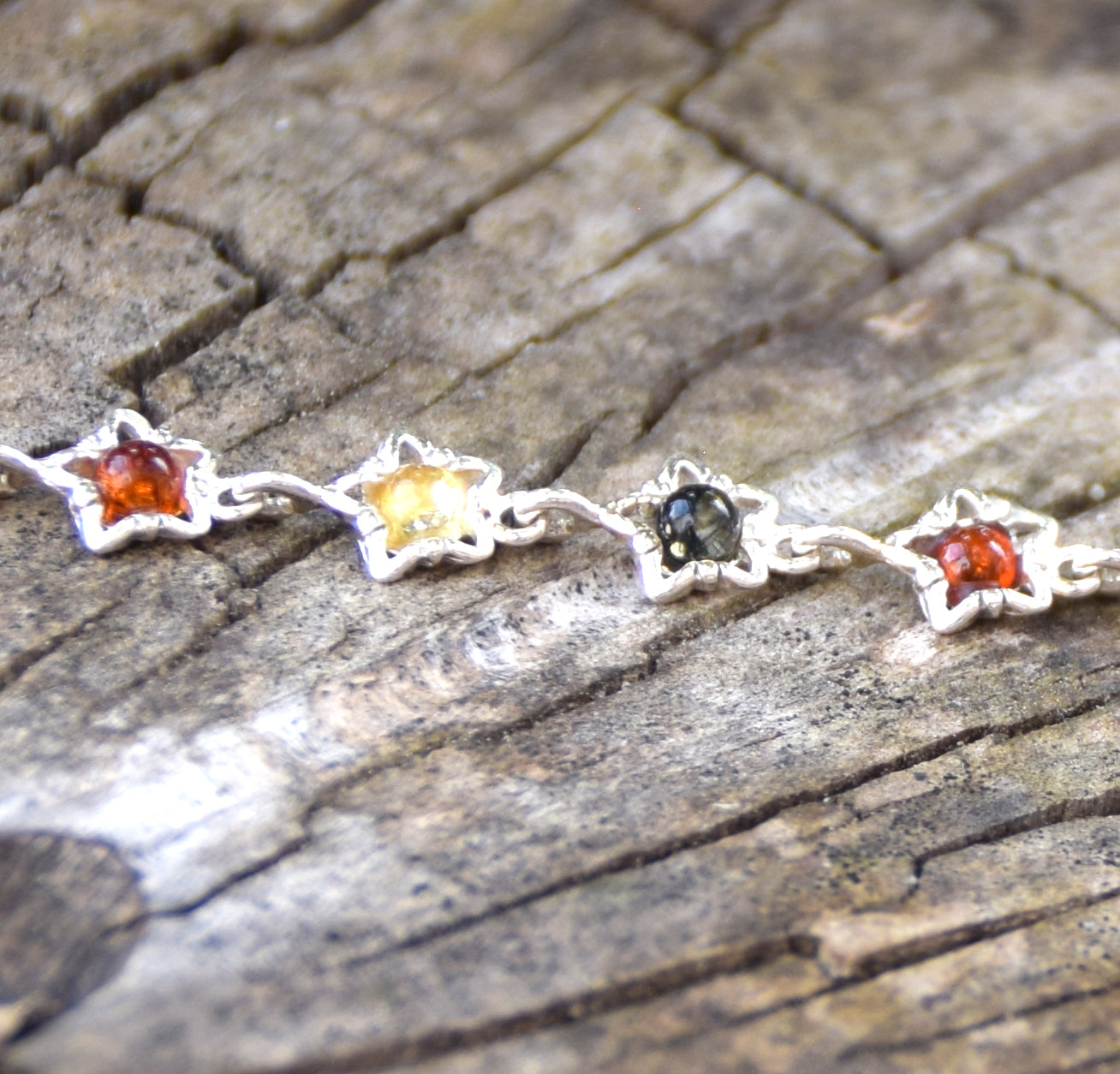 Delicate floral bracelet crafted from natural Amber in various shades and 925 Sterling Silver, MJ Baltica, BB108