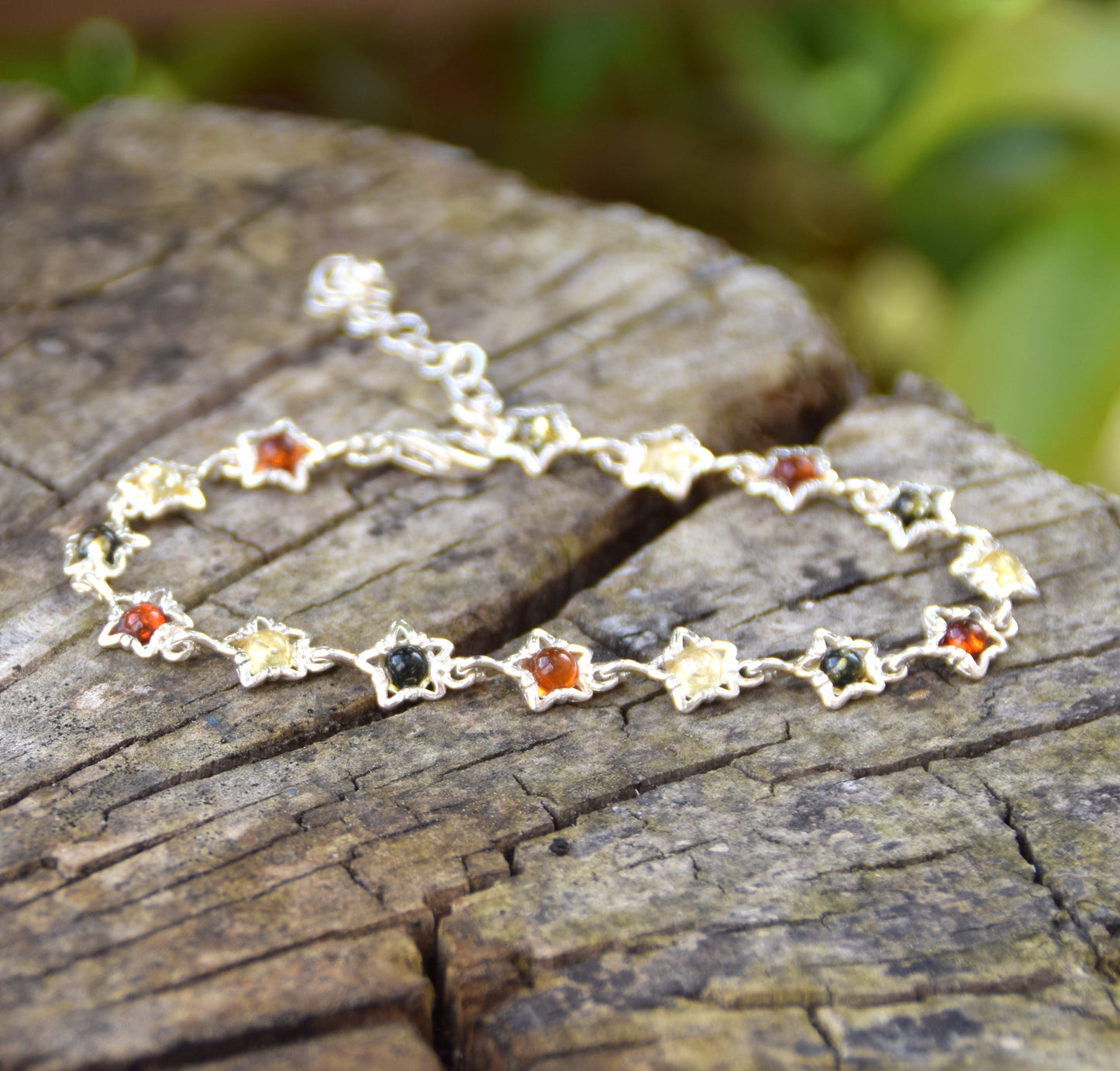 Delicate floral bracelet crafted from natural Amber in various shades and 925 Sterling Silver, MJ Baltica, BB108