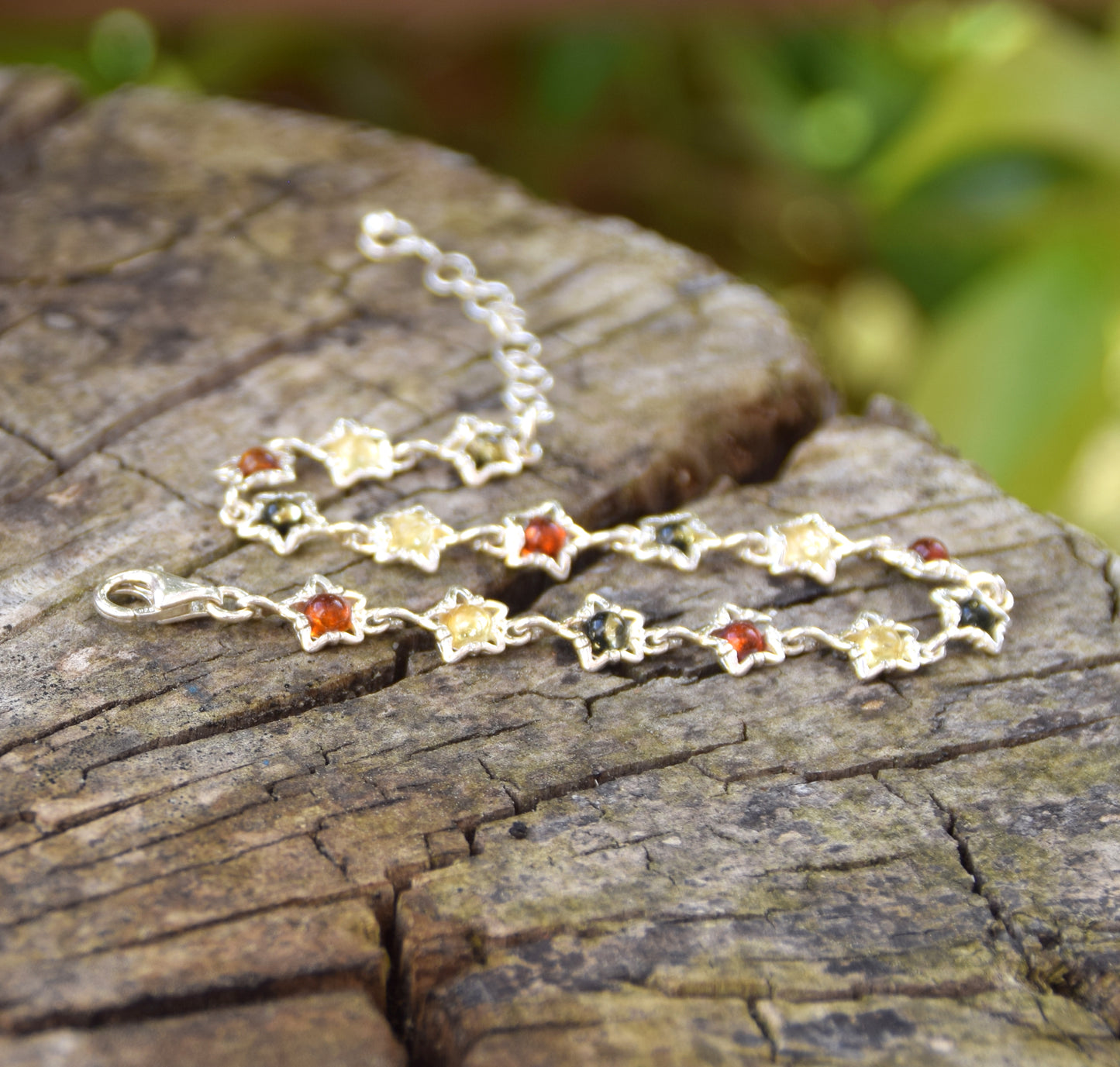 Delicate floral bracelet crafted from natural Amber in various shades and 925 Sterling Silver, MJ Baltica, BB108