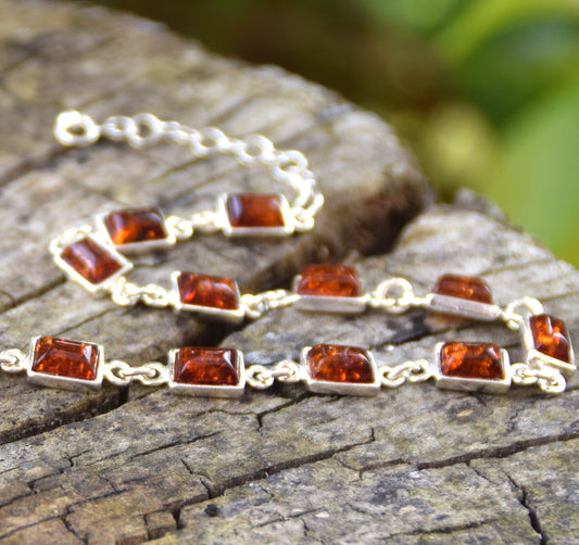 Bracciale regolabile in stile liberty creato con Ambra naturale di color cognac e Argento 925, MJ Baltica, BB109