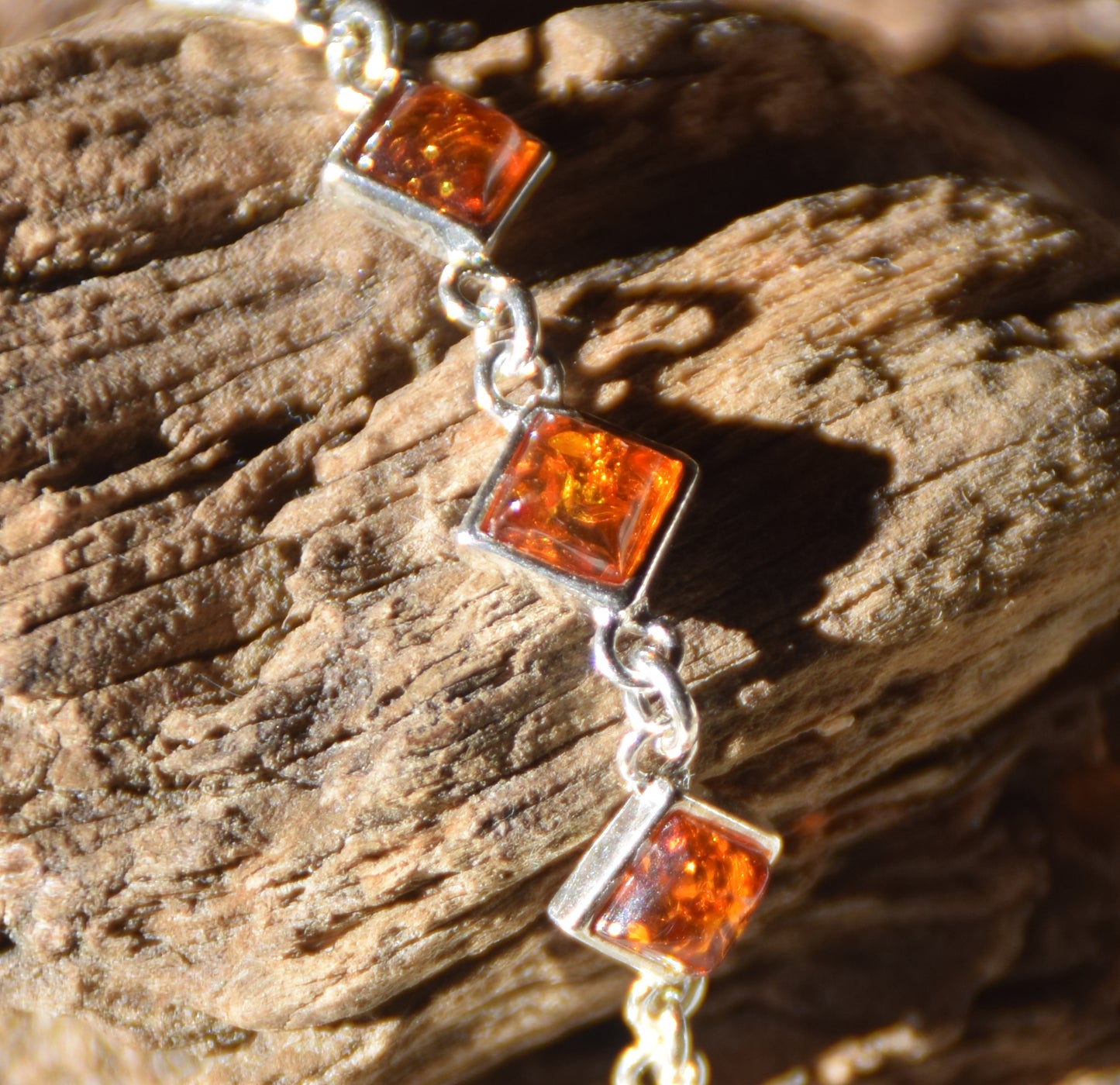 Adjustable minimalist bracelet made with natural cognac-colored Amber and Sterling Silver 925, MJ Baltica, BB111