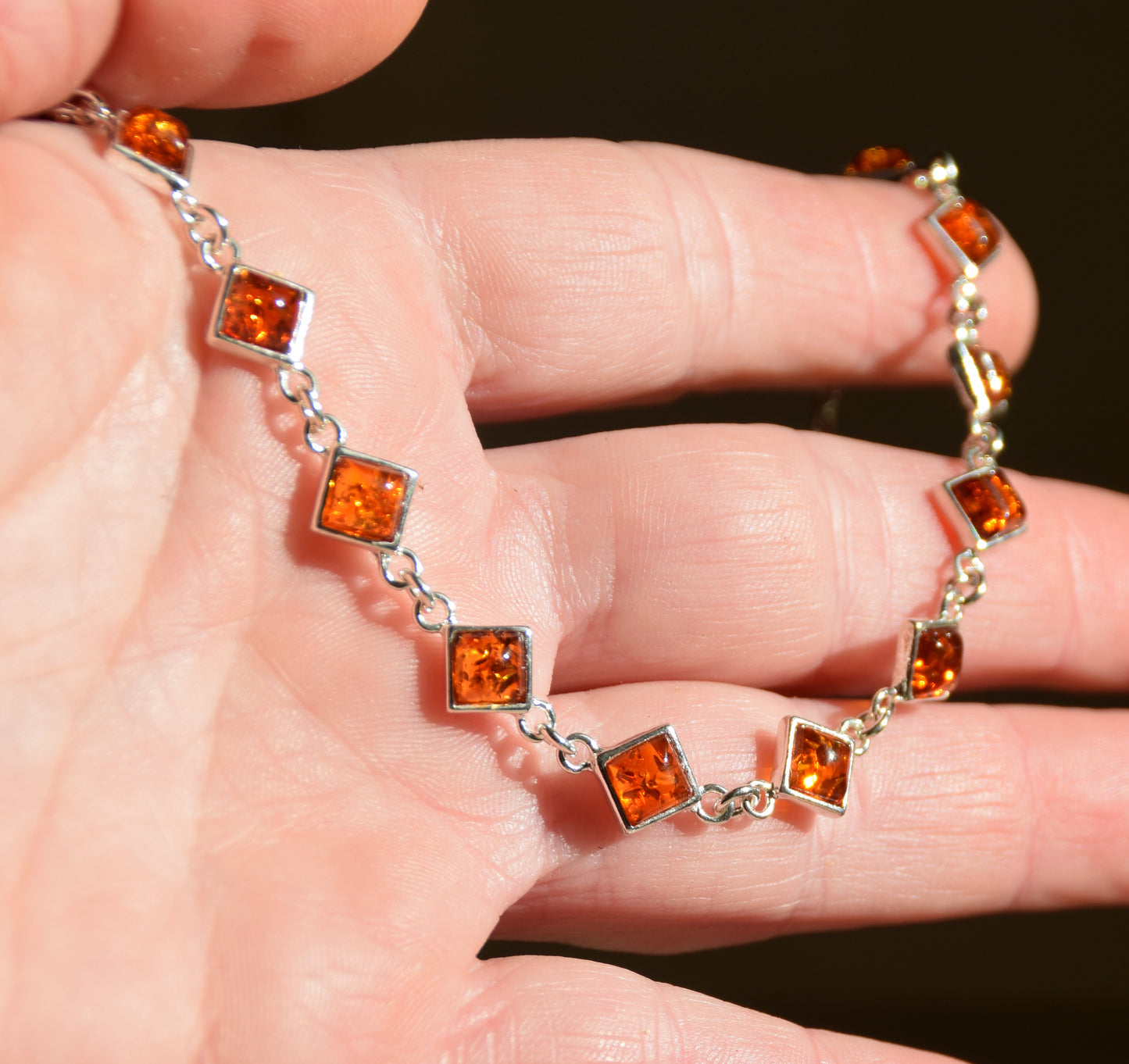Adjustable minimalist bracelet made with natural cognac-colored Amber and Sterling Silver 925, MJ Baltica, BB111