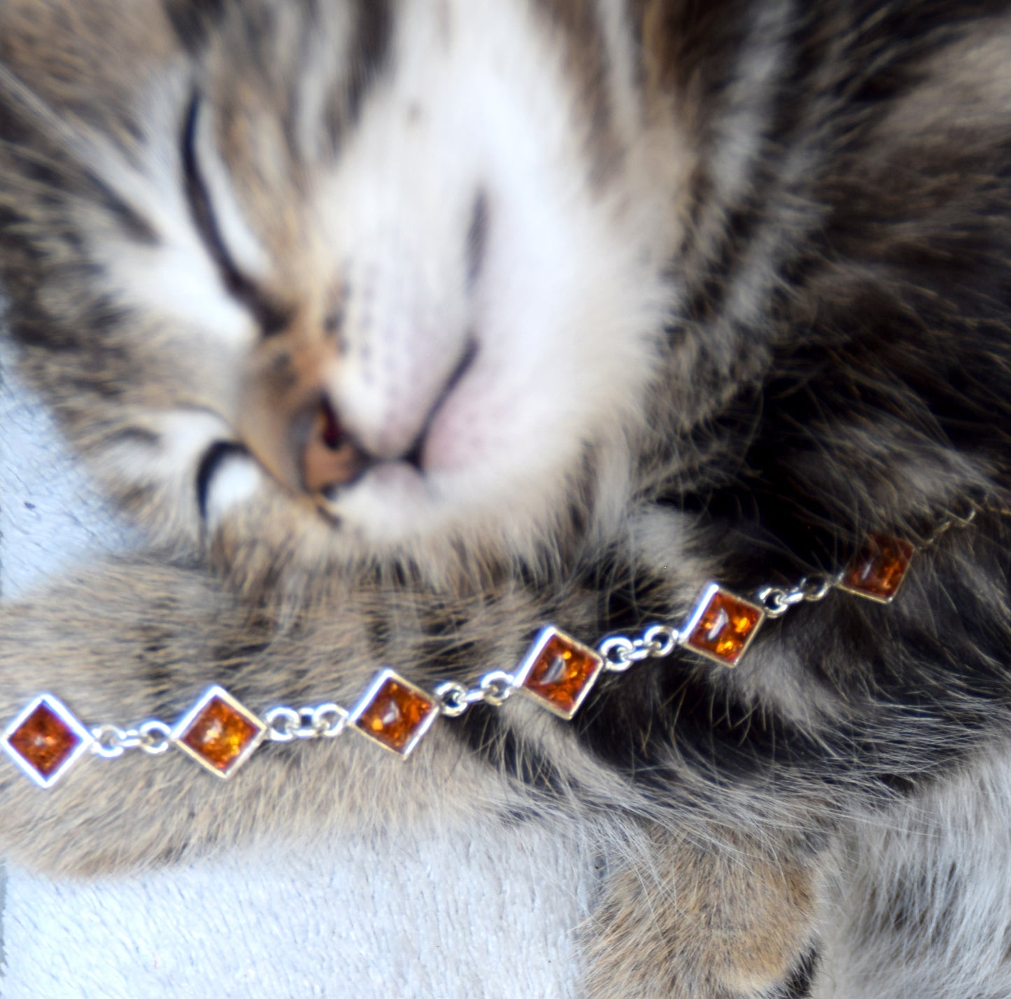 Adjustable minimalist bracelet made with natural cognac-colored Amber and Sterling Silver 925, MJ Baltica, BB111