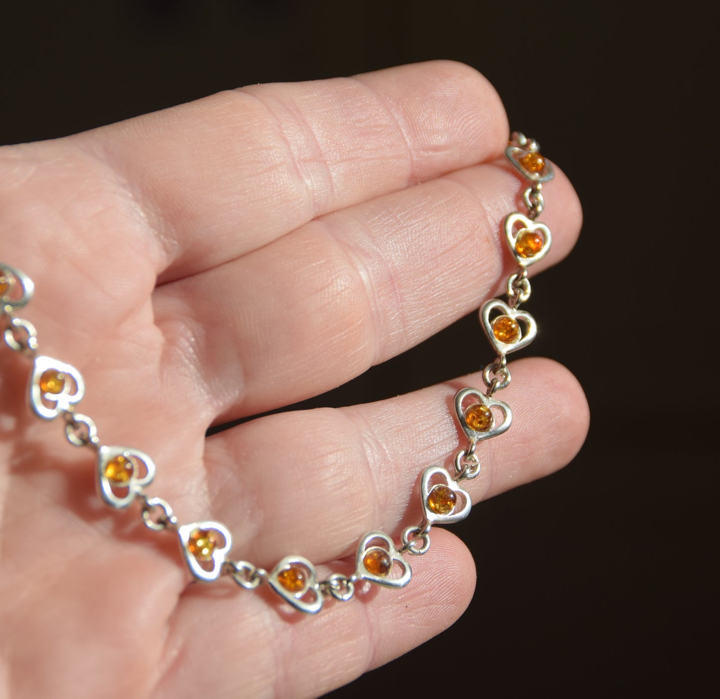 Romantic bracelet with heart chain in cognac natural Amber and 925 Sterling Silver, MJ Baltica, BB113