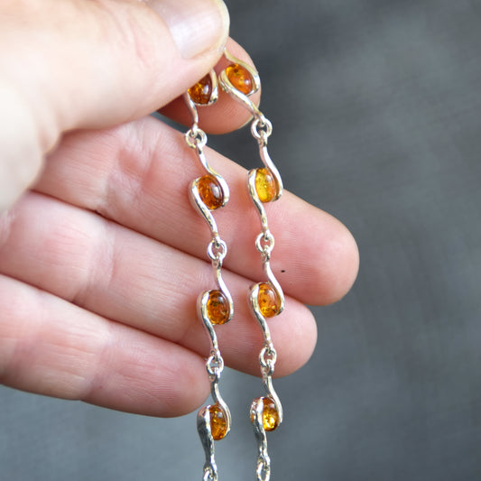 Luminoso bracciale regolabile creato con Ambra naturale di color cognac e Argento 925, MJ Baltica, BB122