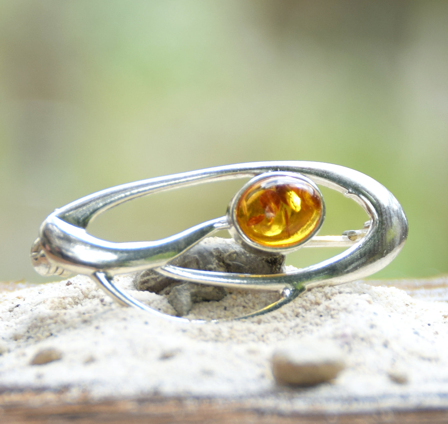 Delicate brooch created with natural cognac-colored amber and 925 Silver, MJ Baltica, BBR002