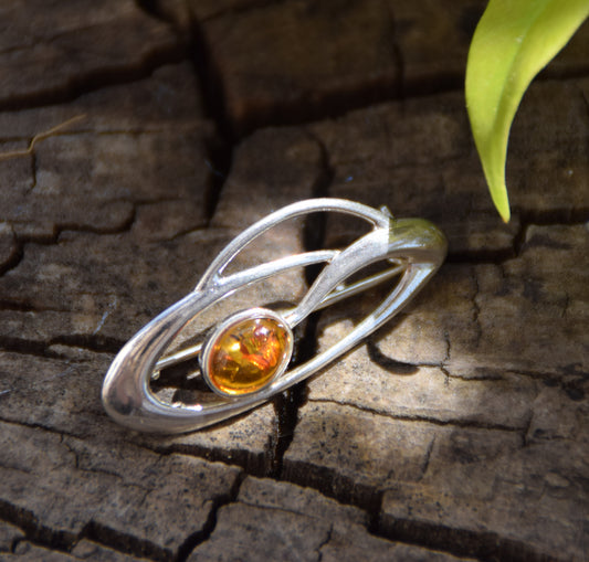 Delicate brooch created with natural cognac-colored amber and 925 Silver, MJ Baltica, BBR002