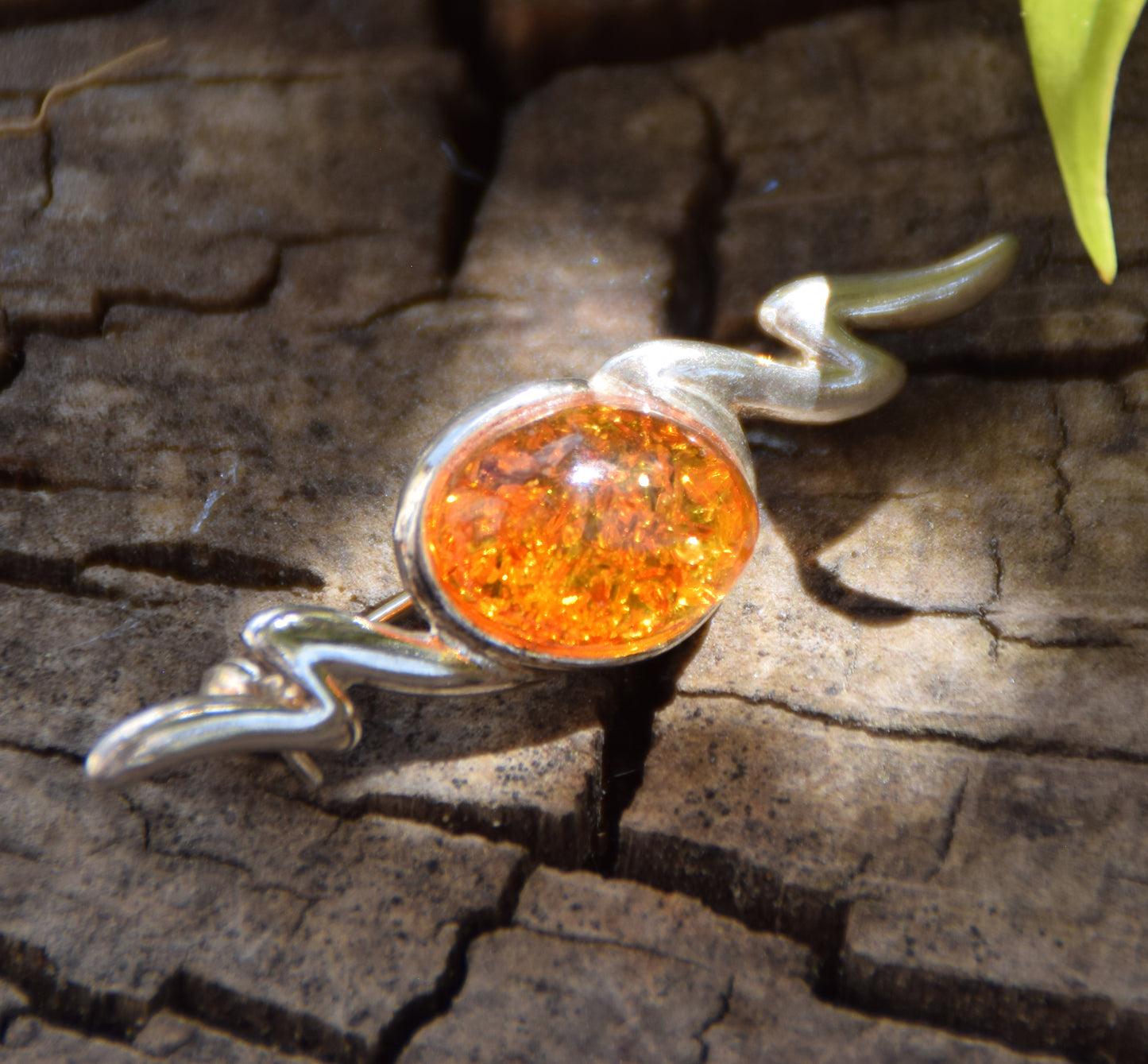 Elegant abstract style brooch crafted with cognac-colored natural Amber and 925 Sterling Silver, MJ Baltica, BBR003