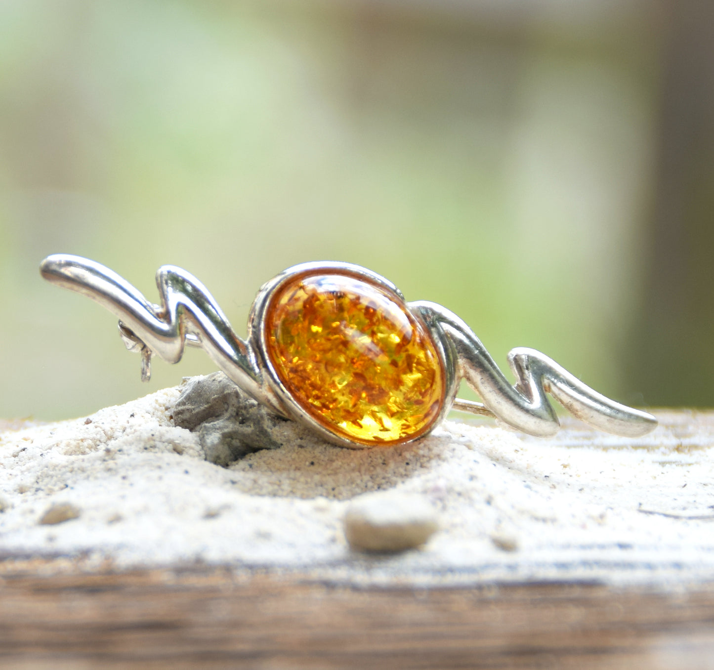 Elegant abstract style brooch crafted with cognac-colored natural Amber and 925 Sterling Silver, MJ Baltica, BBR003