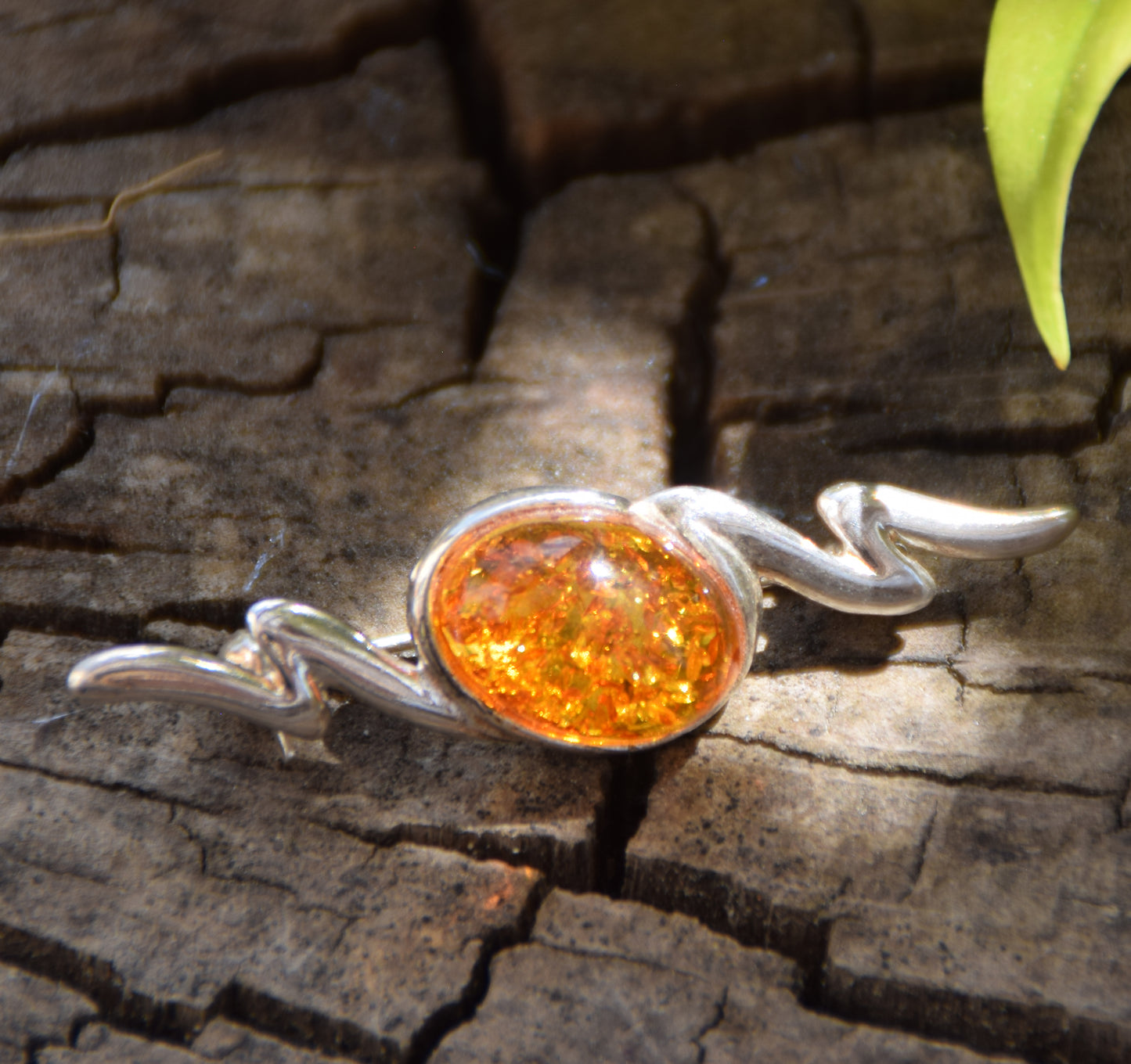 Elegant abstract style brooch crafted with cognac-colored natural Amber and 925 Sterling Silver, MJ Baltica, BBR003