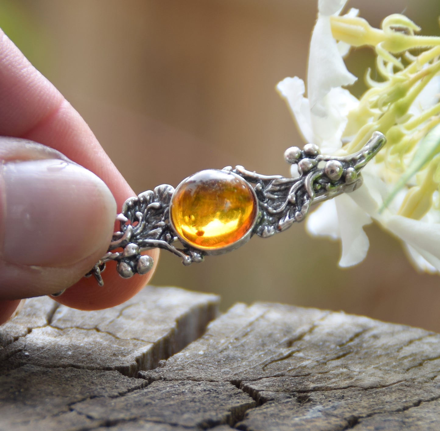 Vintage brooch with floral design created with natural cognac-colored Amber and 925 Silver, MJ Baltica, BBR016