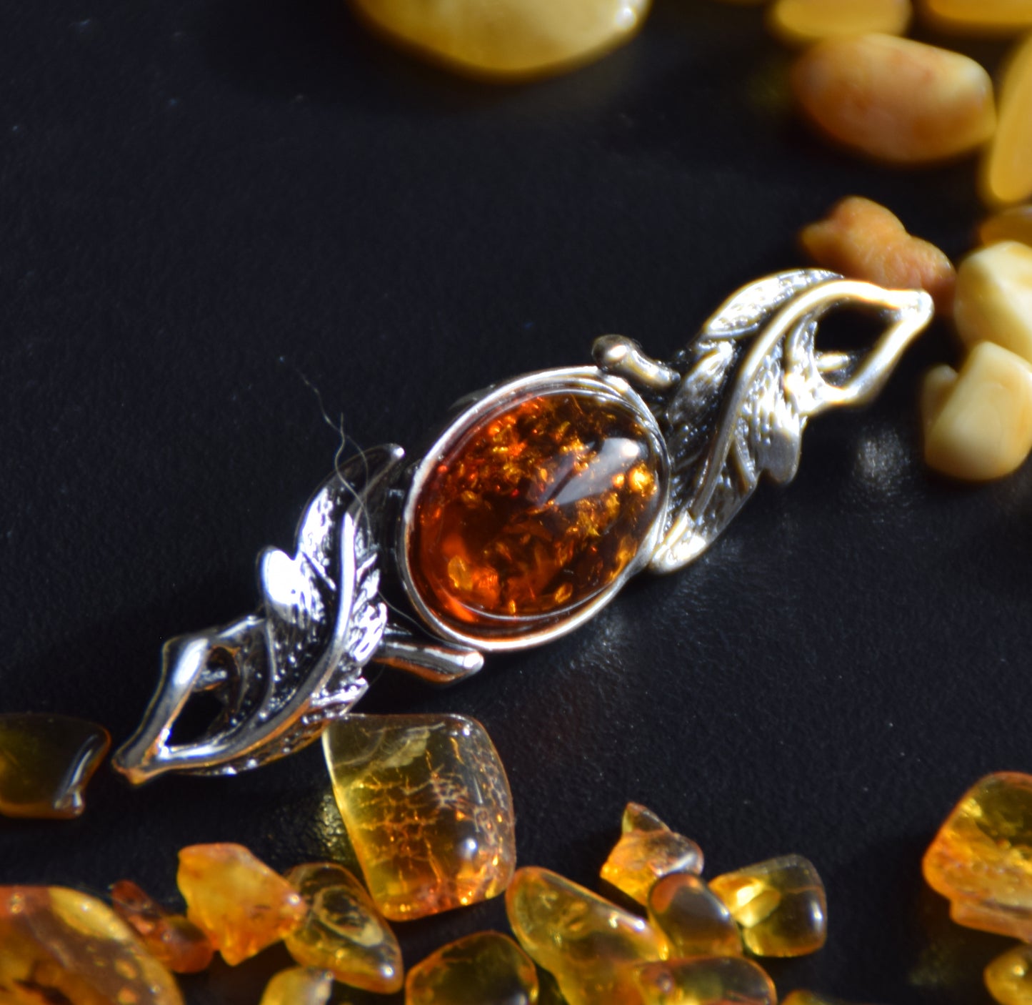 Vintage-style floral design brooch crafted with natural cognac amber and 925 silver, MJ Baltica, BBR017
