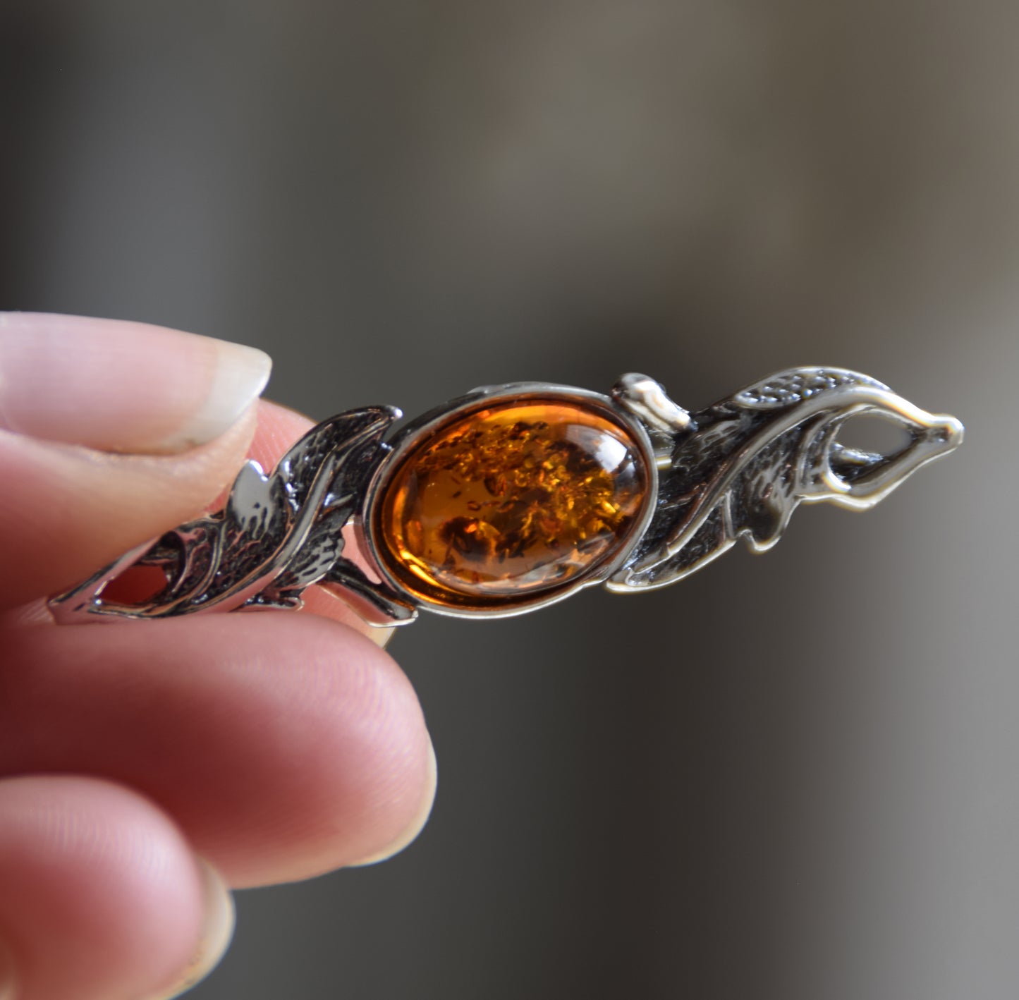 Vintage-style floral design brooch crafted with natural cognac amber and 925 silver, MJ Baltica, BBR017